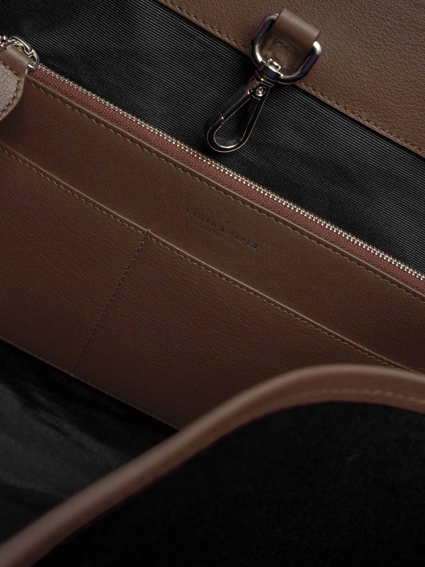 Detail view of the open pockets in The Metro Tote in the color Cordoba.