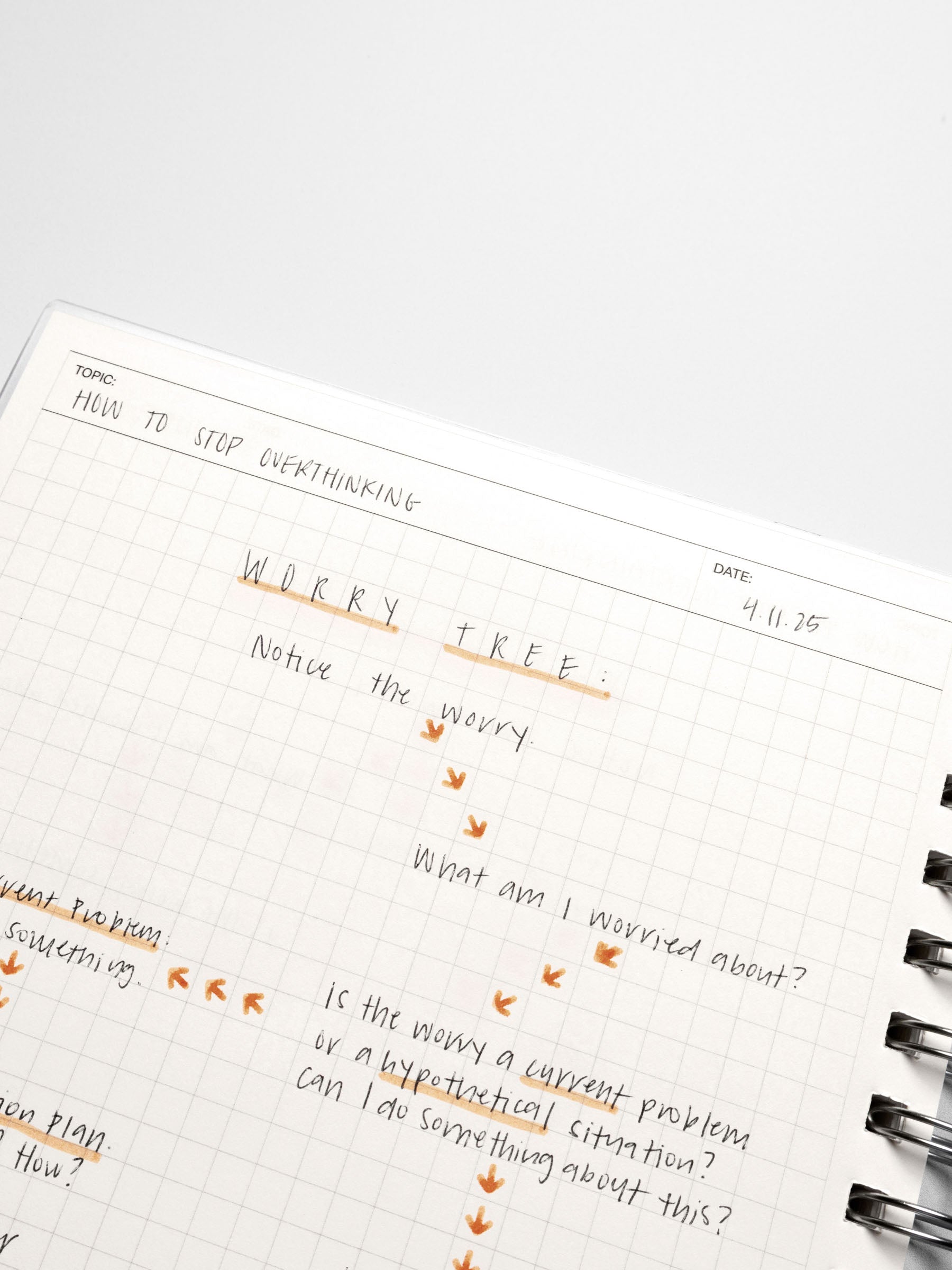 HP Classic notebook displayed on a neutral background. Sample text is written inside of it with several sections highlighted.
