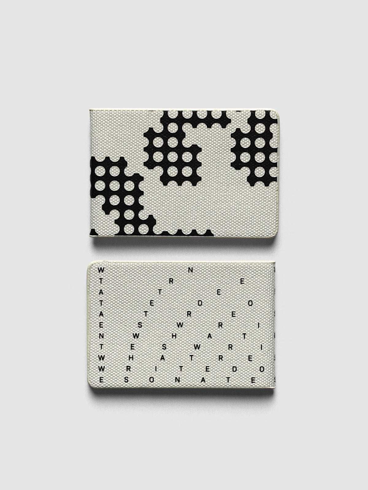 Magnetic Bookmarks Punched Holes & Margin, both bookmarks folded and laid one above the other