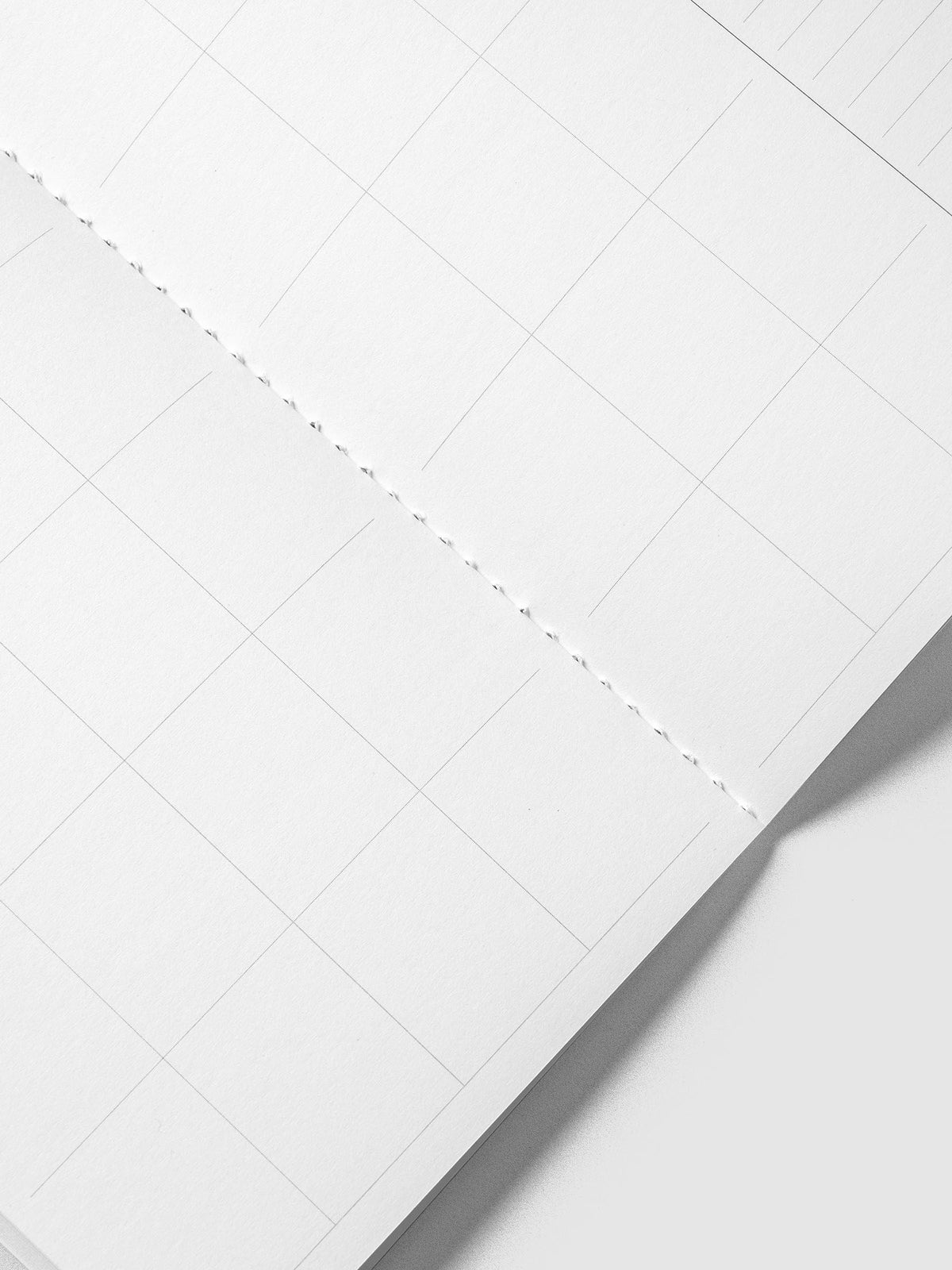 Close-up of the calendar grid and white stitched binding inside the Monthly Overview A5 Slim