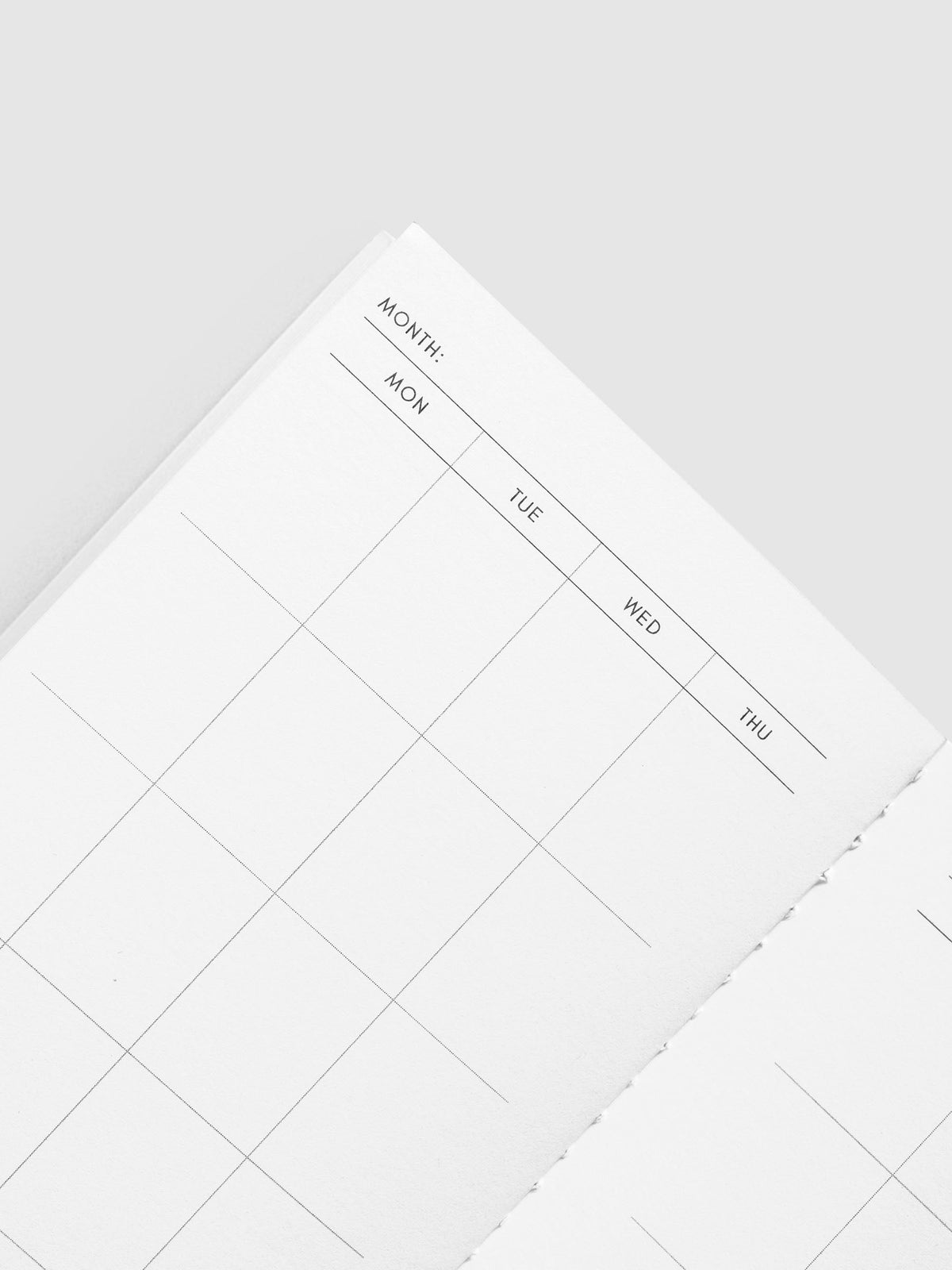 Close-up of the Month line and Monday to Thursday columns of the calendar spread in the Monthly Overview Pocket Plus