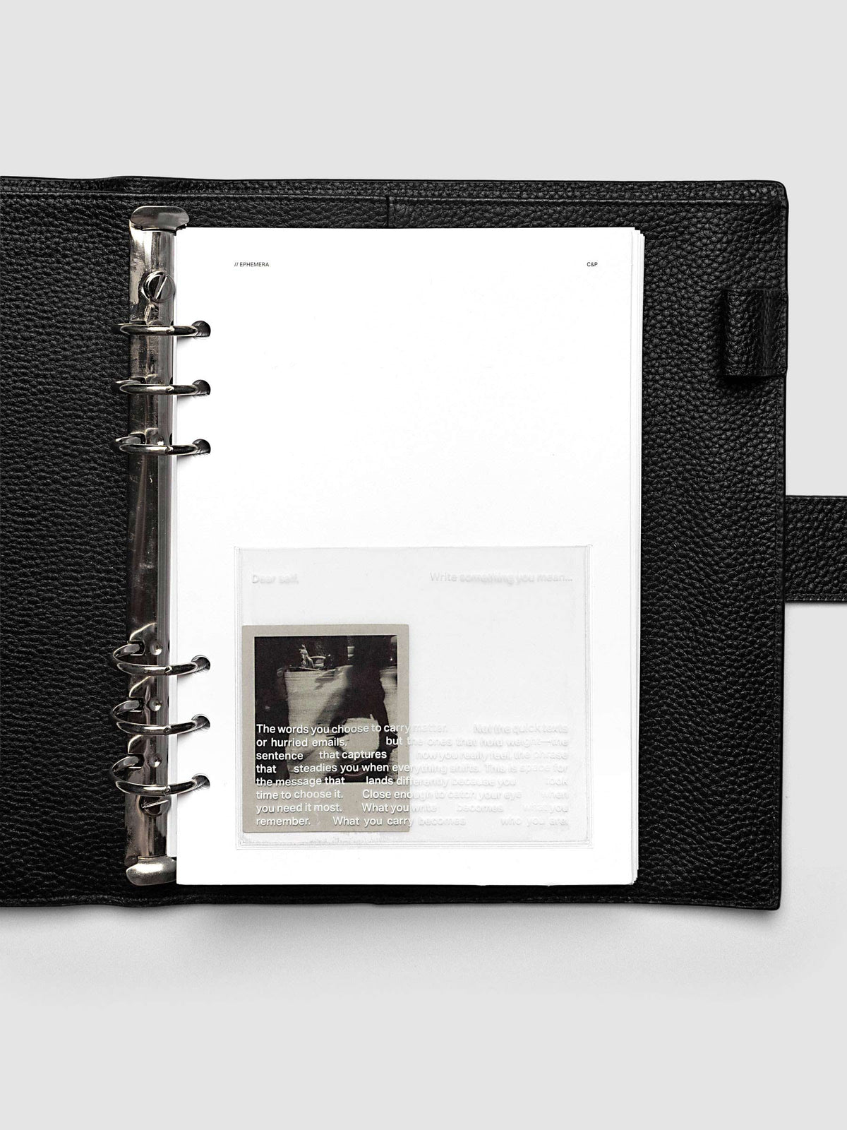 White Ephemera Planner Dashboard shown in size A5 in a black leather agenda.