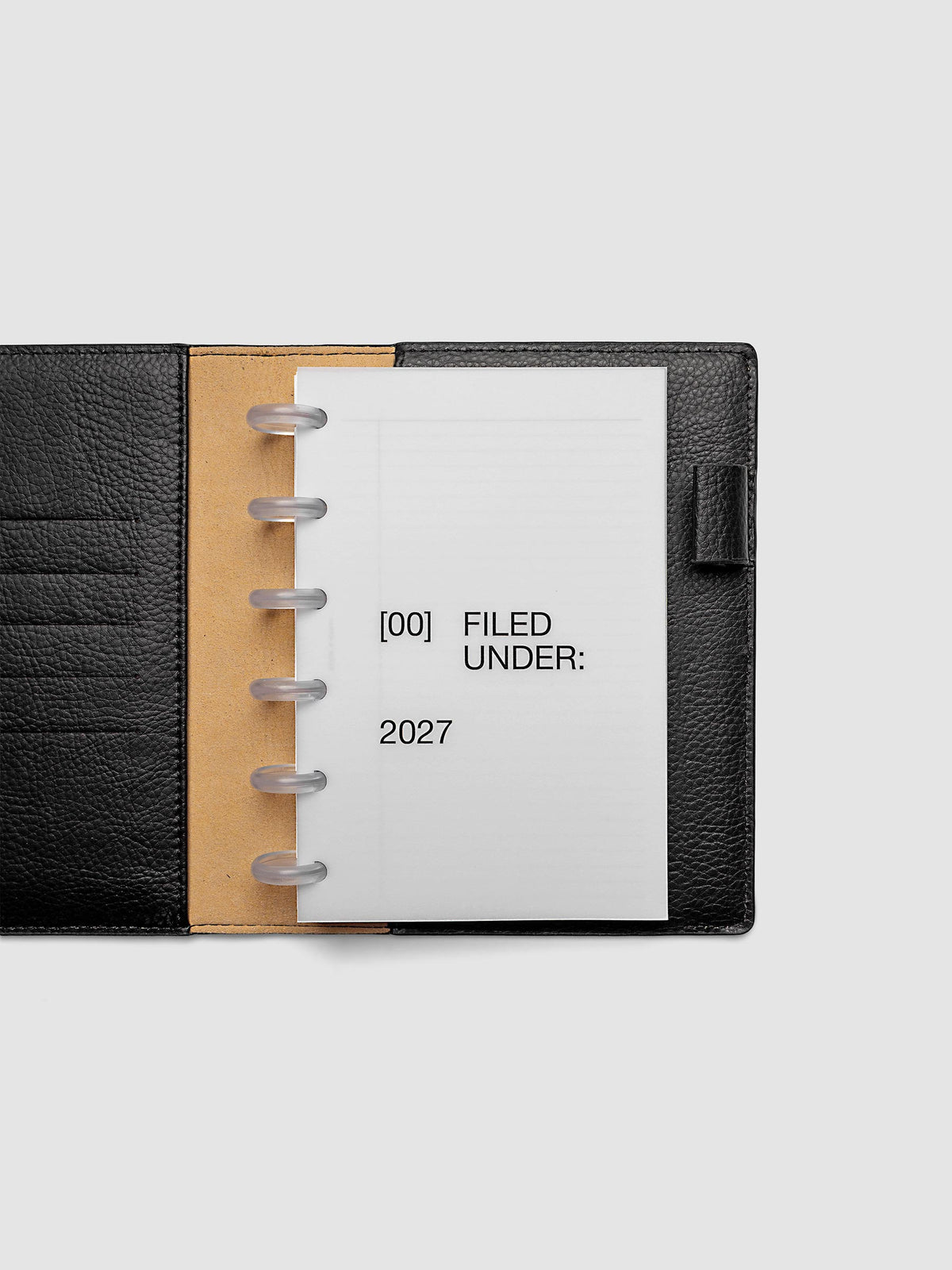 2027 Front + Monthly Dashboard Overlays, Avant Garde, CP Petite 6-Disc Punch, vellum dashboard overlay shown layered inside a planner