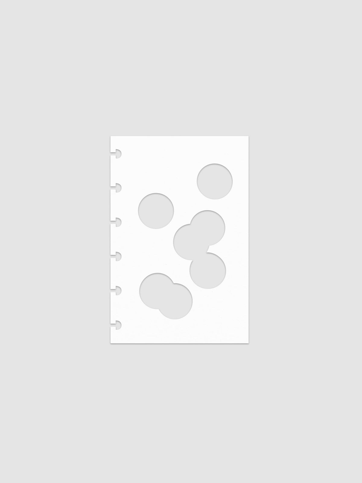 White dashboard from the Ink Blot Planner Dashboard Duo on a neutral background in size CP Petite, pre-punched for discbound planners.