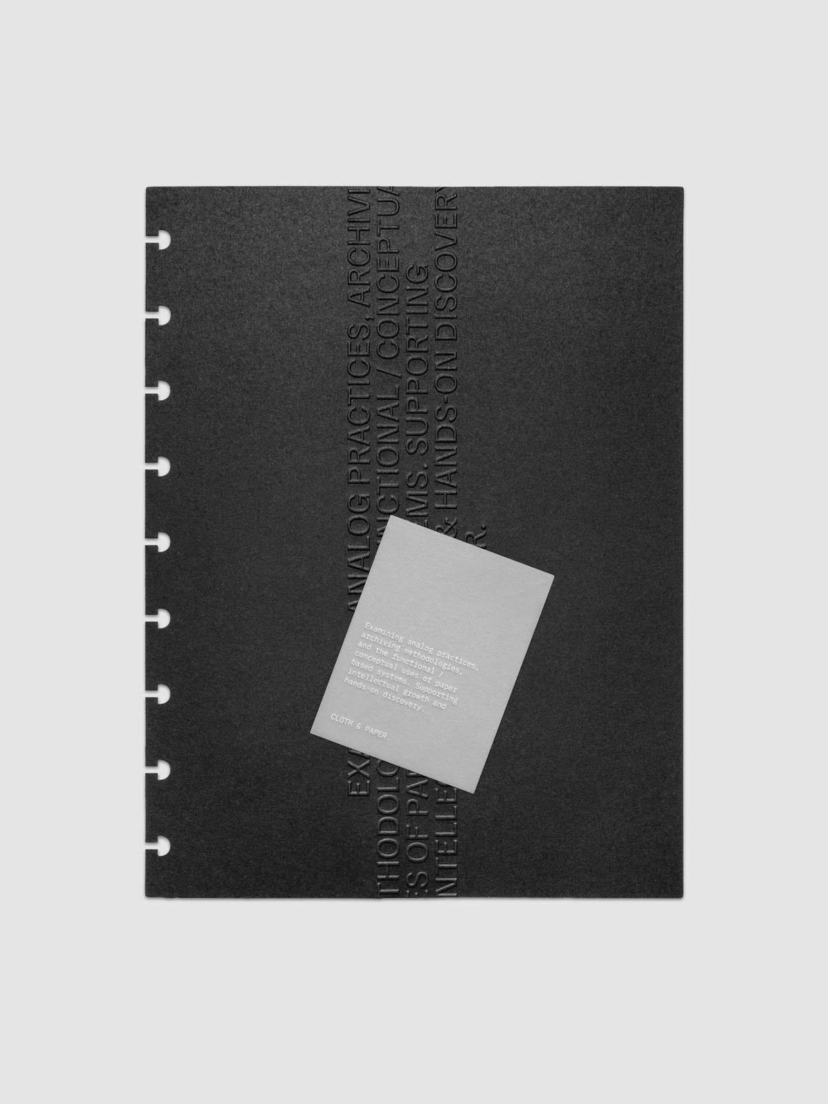 Black embossed Analog Embossed Planner Dashboard with drop card shown in size HP Classic 9-Disc Punch.