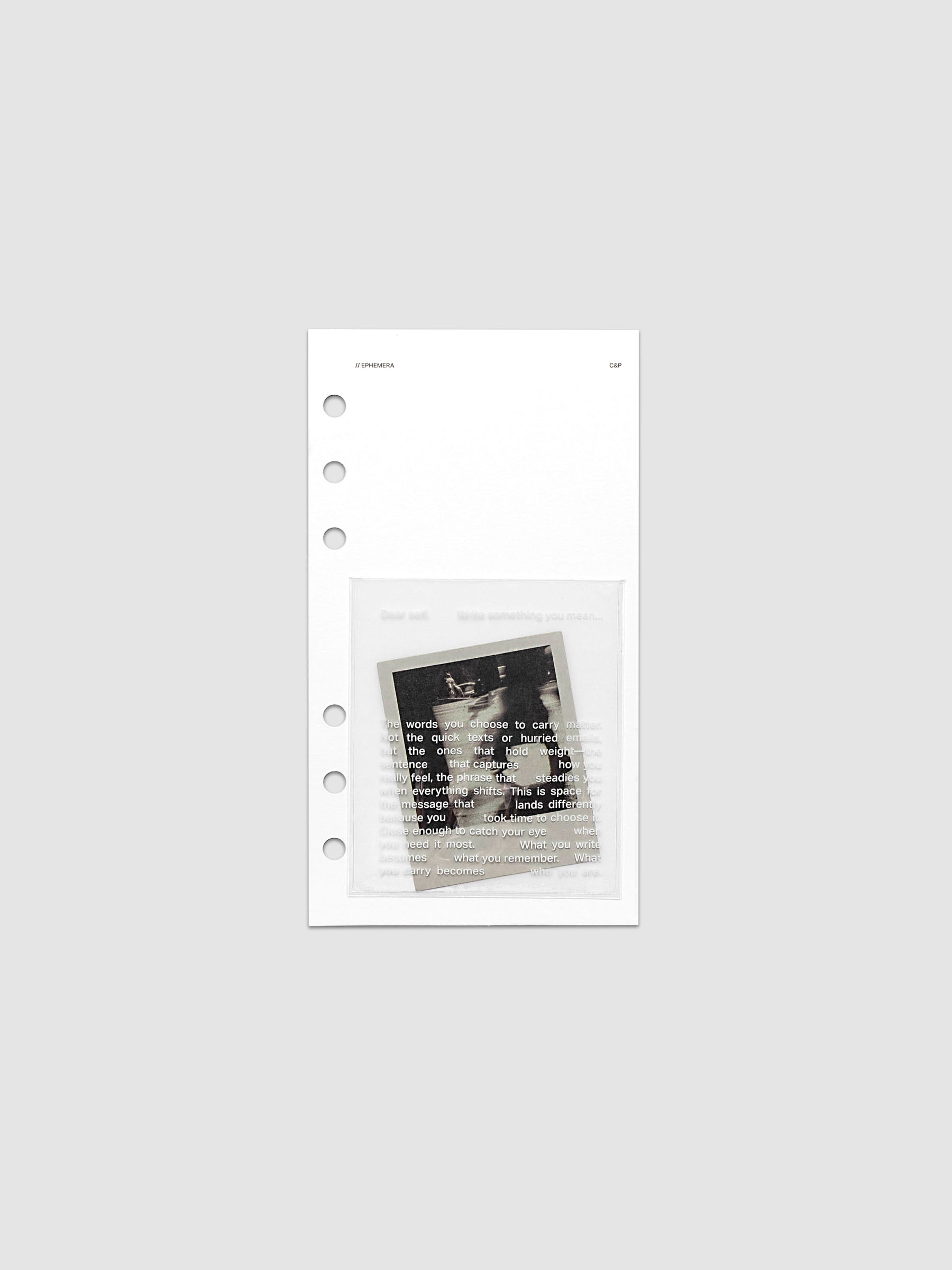 White Ephemera Planner Dashboard with transparent pocket and journaling card shown pre-punched for Personal 6-ring planners.