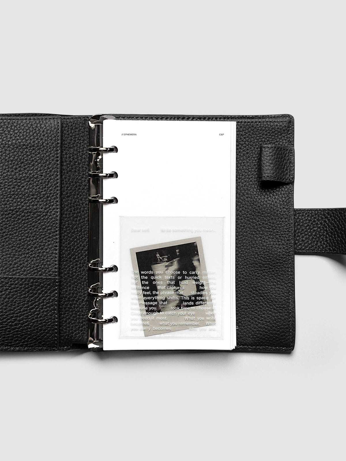 White Ephemera Planner Dashboard shown in size Personal in a black leather agenda.