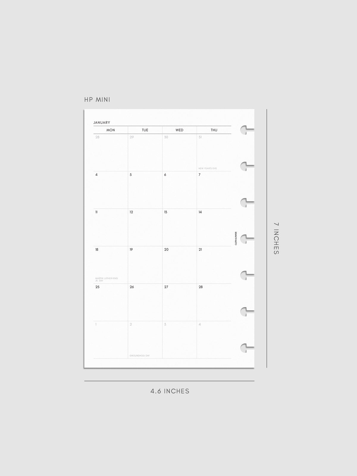 2027 Dated Monthly Planner Inserts, Monday Start, HP Mini 7-Disc Punch, left page of two-page monthly calendar spread with Monday start shown inside a planner