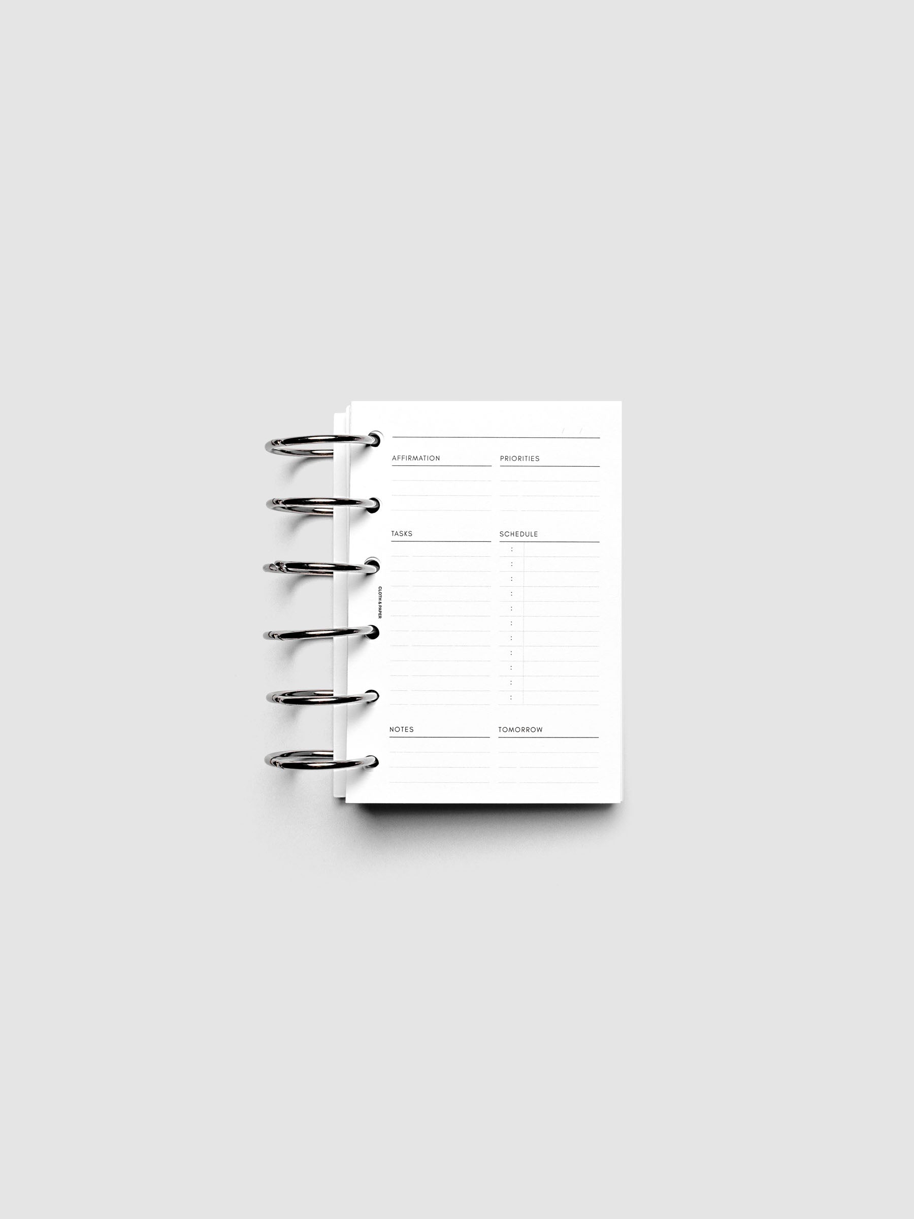 Daily Essentials Planner Inserts shown ring bound in size Pocket.