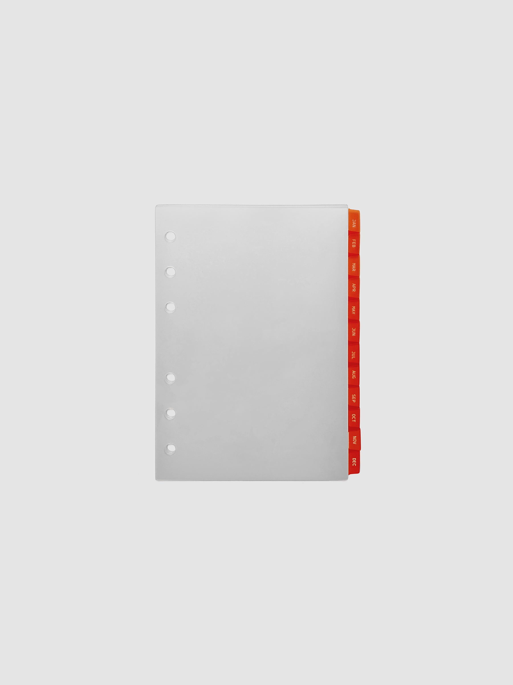 A6 6-Ring Punch Ultra-Thin Monthly Dividers in deep orange, set of 12 dividers fanned to show all months