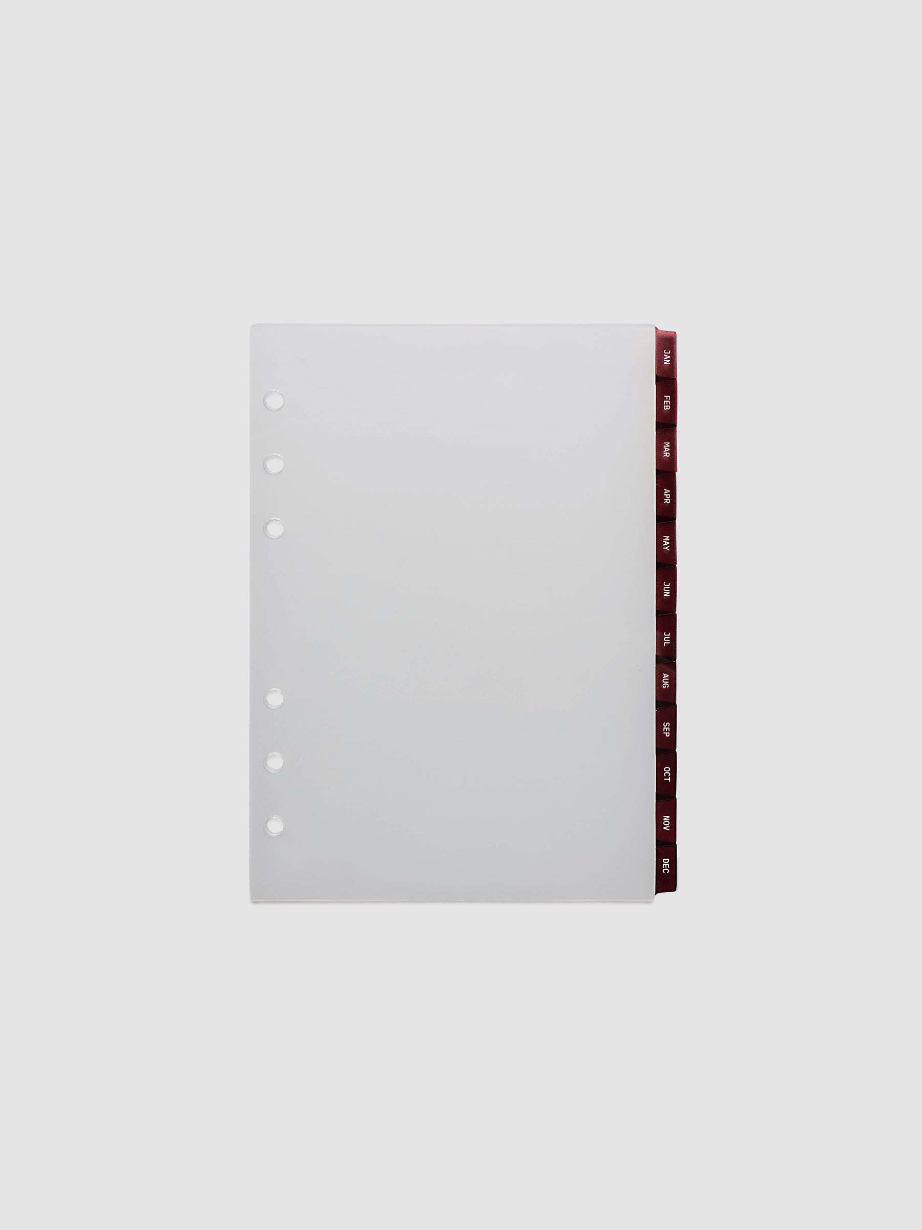 Personal Wide 6-Ring Punch Ultra-Thin Monthly Dividers in deep red, set of 12 dividers fanned to show all months