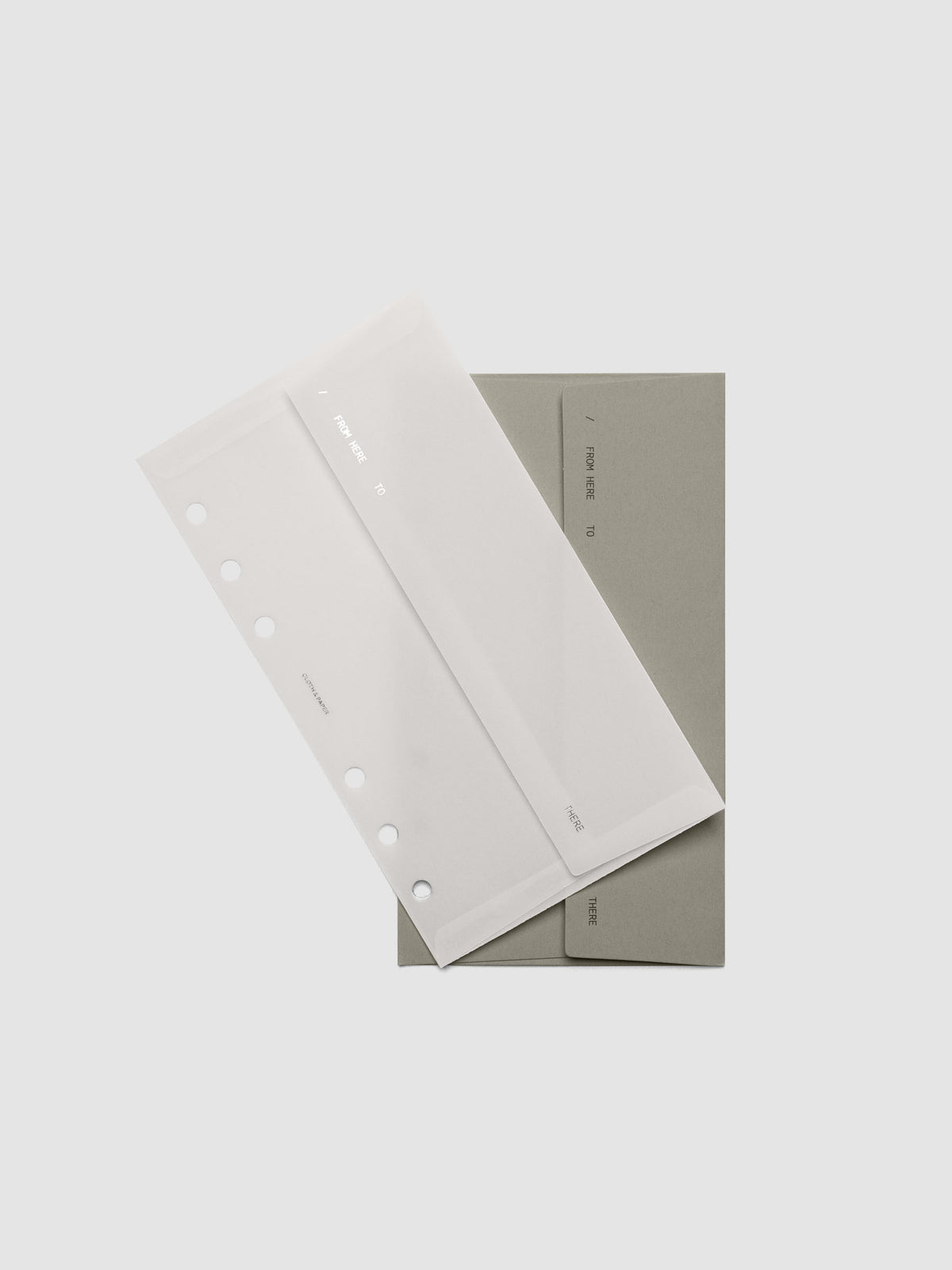 Envelope Storage Holder Set shown pre-punched for Personal 6-Ring planners.
