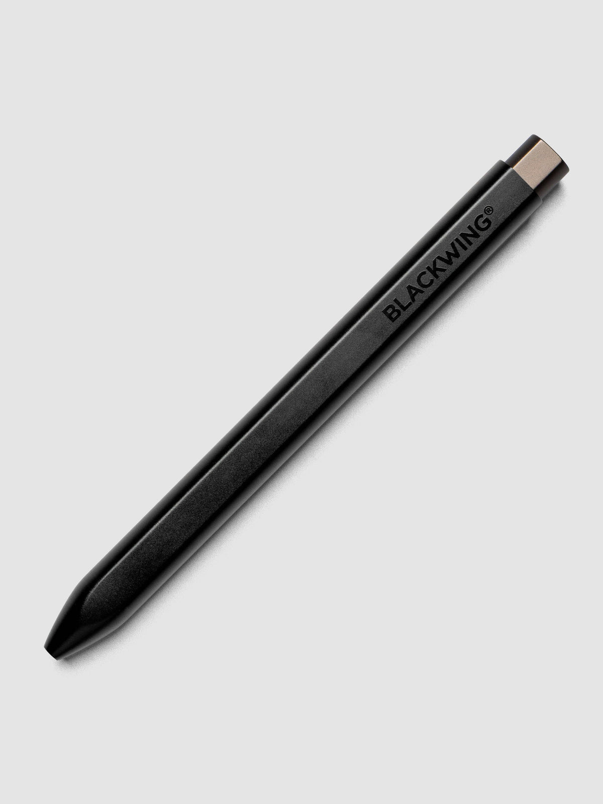 Full product view of the Blackwing pencil in matte black shown with tip retracted.