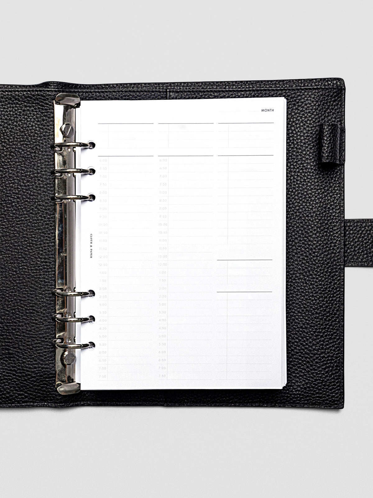 30 Minute Time Block Planner Inserts in size A5 with space for priorities for each day and 30 minute time slots from 6 am to 7:30 pm.