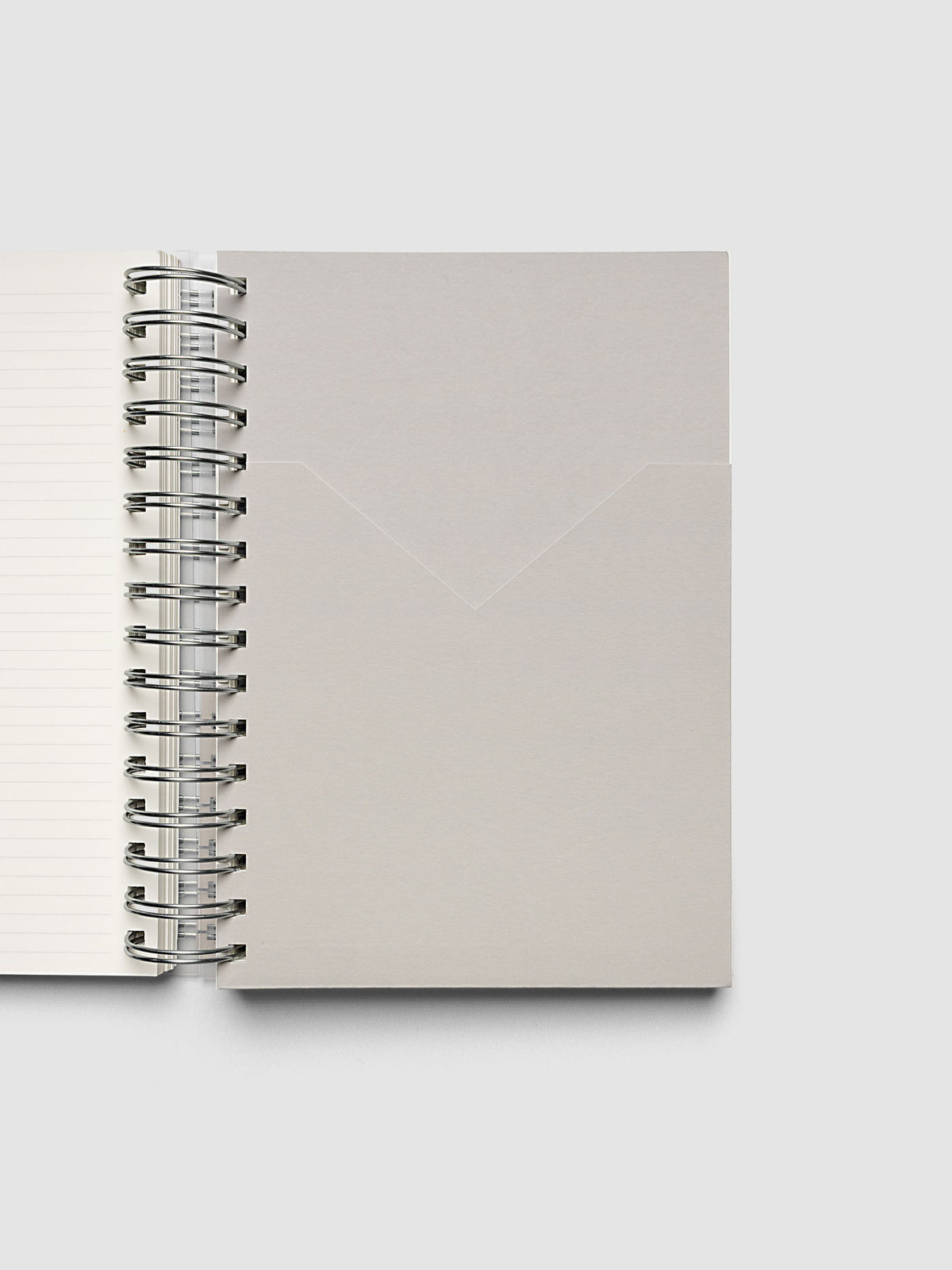 5 Subject Notebook A5 Punch open interior showing concrete grey pocket divider