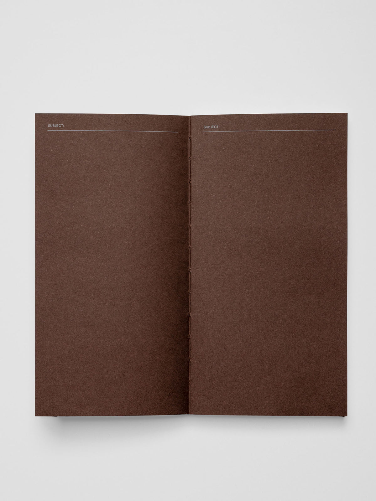 Common Thread Notebook showing the brown interior pages.