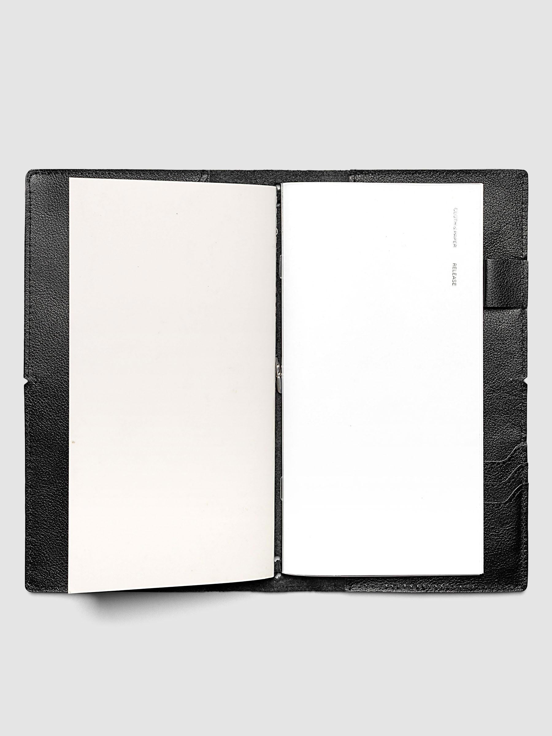 Release paper travel notebook insert in size A5 slim shown inside a travel notebook cover