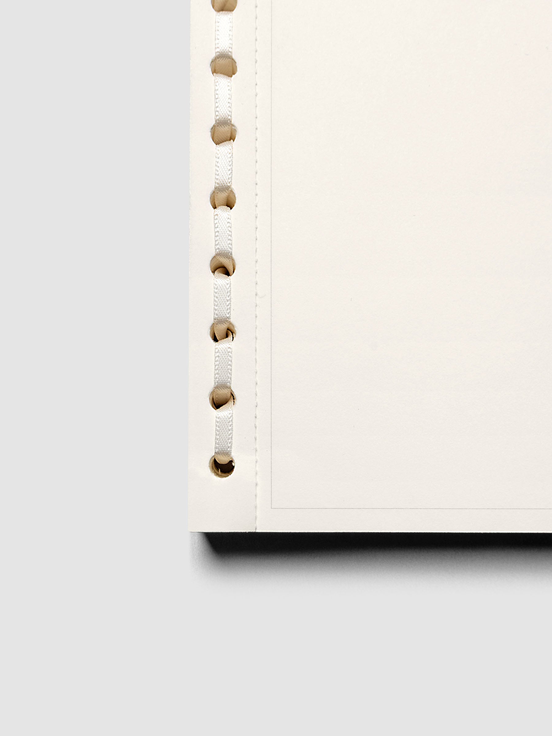 Close up of the ribbon binding on the Message Pad.