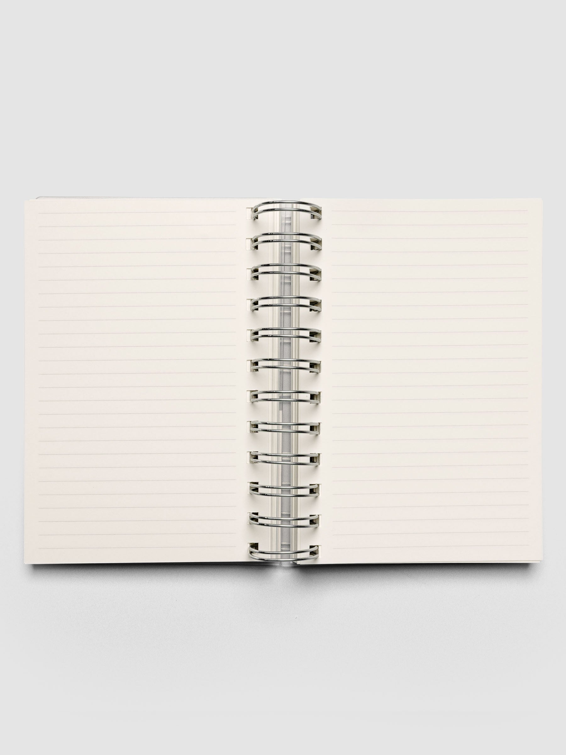 Spiral Notebook in size CP Petite with Lined Notes interior shown open displaying both left and right pages.