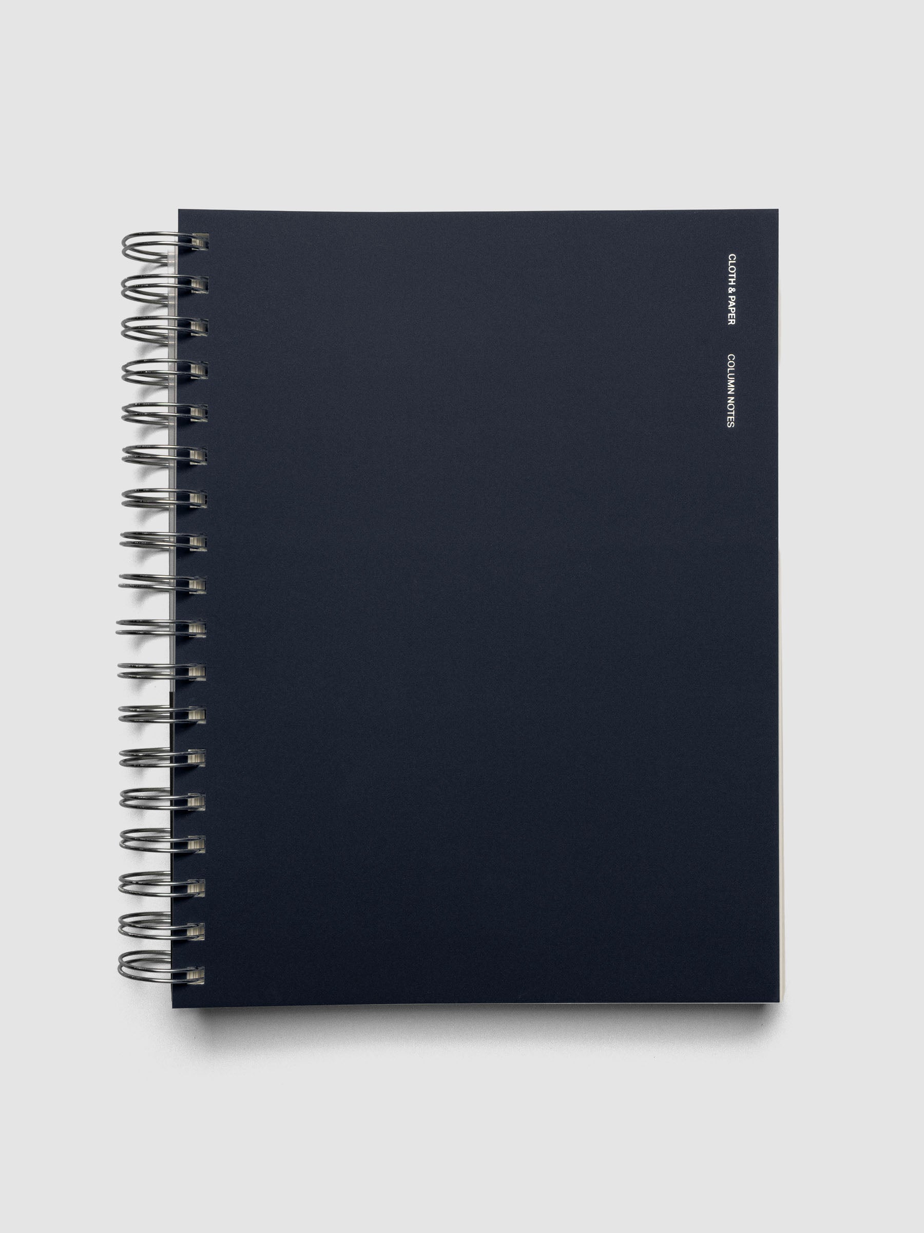 Spiral Notebook in size HP Classic and color Apollo (blue) with Column Note interior layout shown closed.