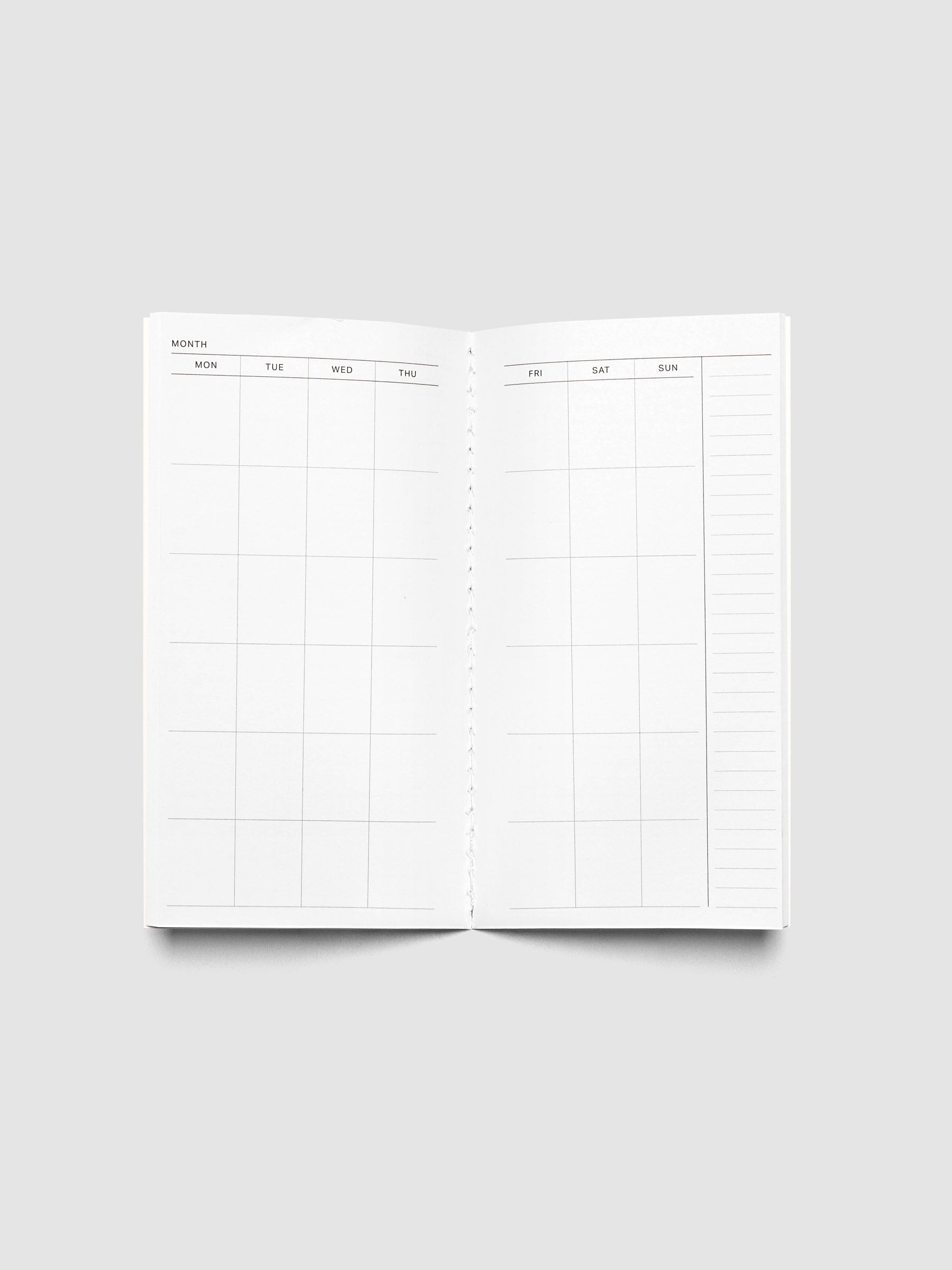 Monthly Overview notebook interior in size pocket plus.