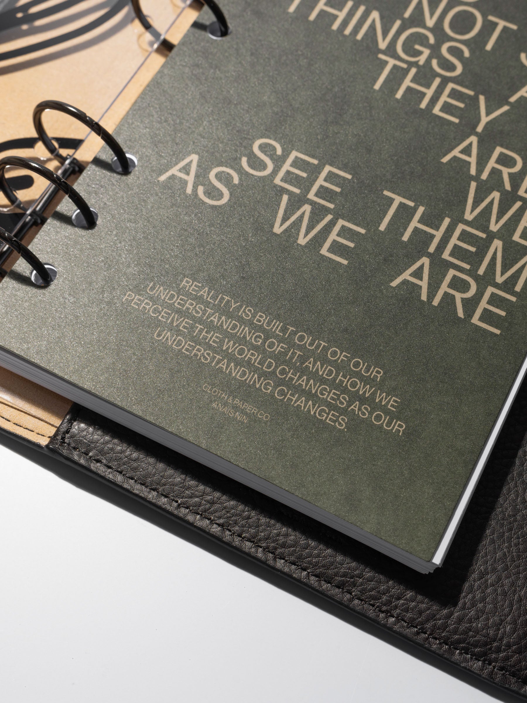 As We Are Cover + Dashboard Set in size Personal Wide shown ring bound in a black leather folio close up.