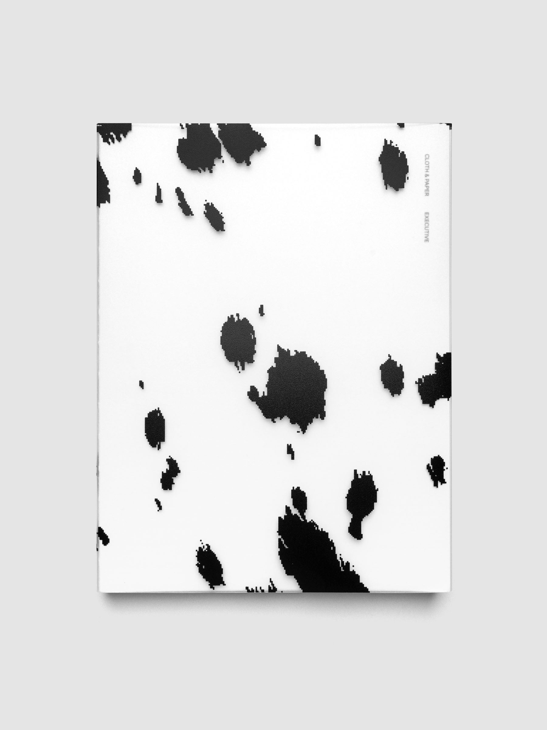 HP Classic frosted plastic notebook cover with black dalmatian animal print pattern on a Perfect Bound Notebook