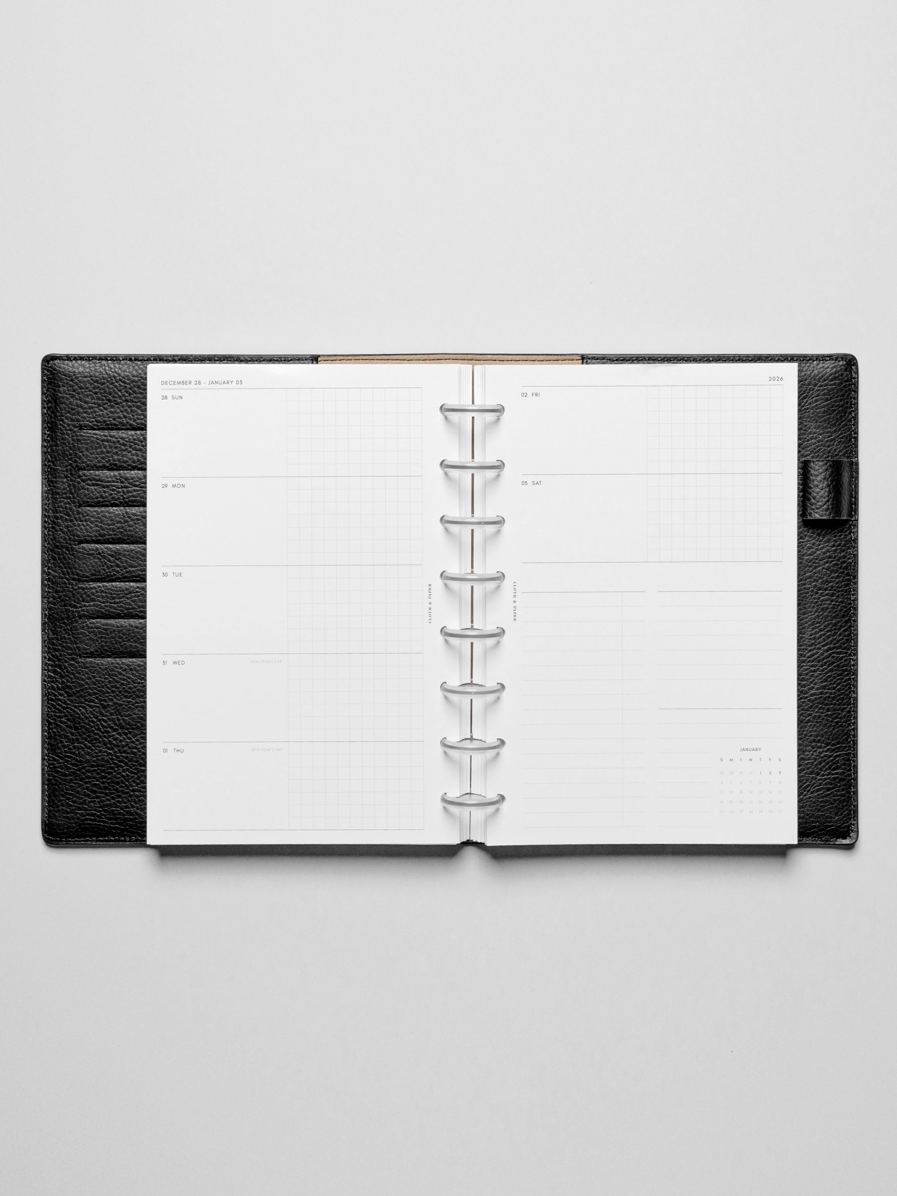 Inserts in use inside a leather planner.