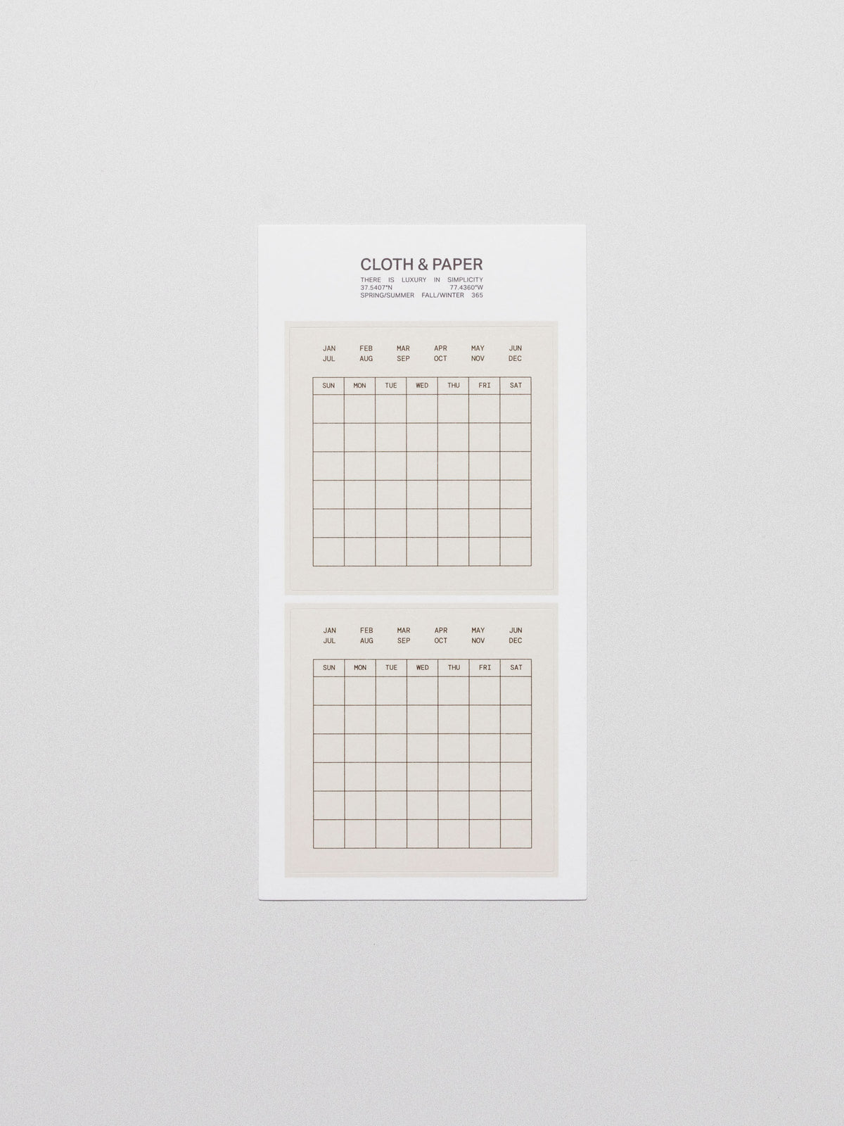 Calendar stickers displayed on a neutral background.