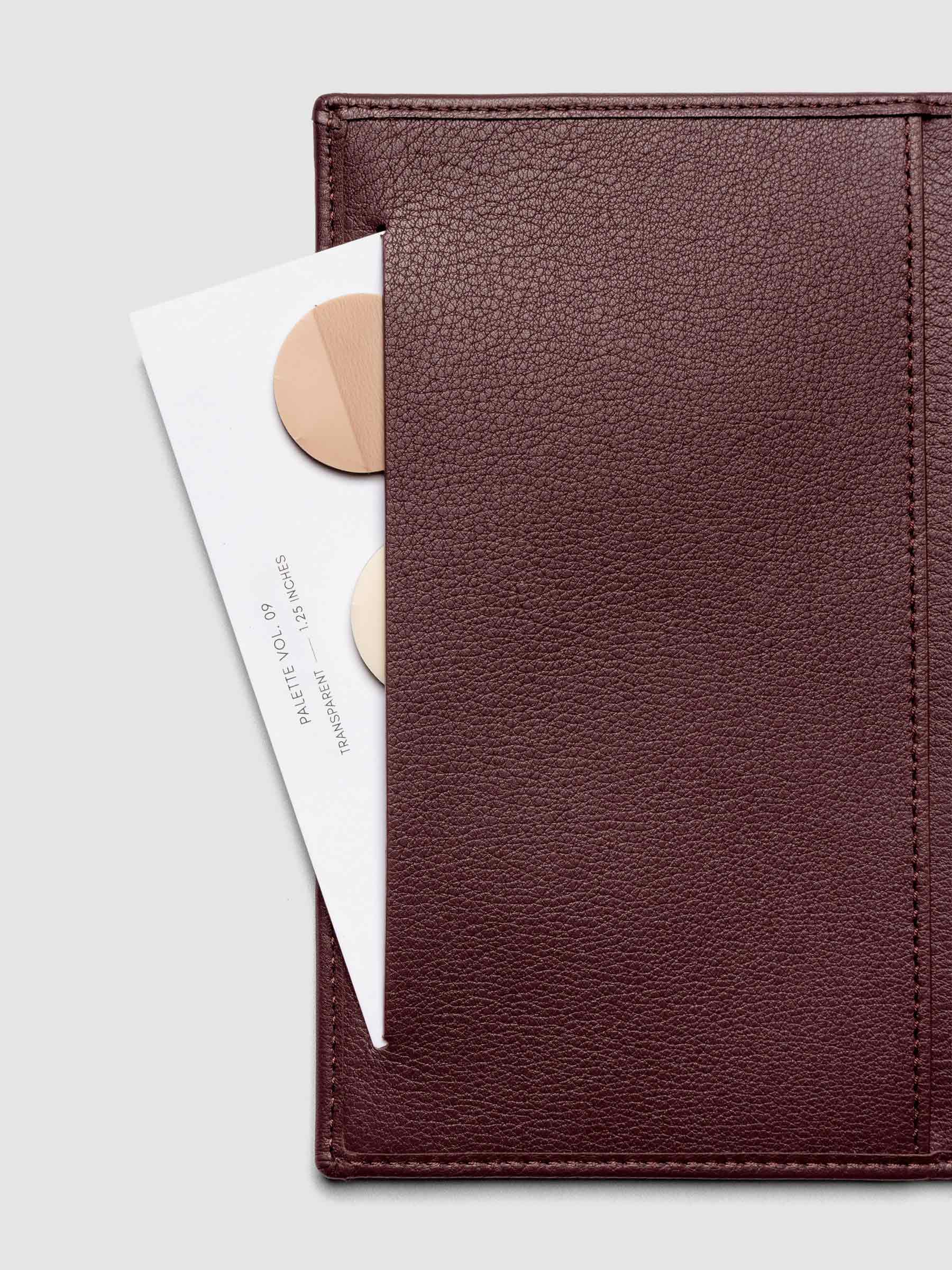Close-up of Nomada Wallet slit pocket in Madrid with page flags inside