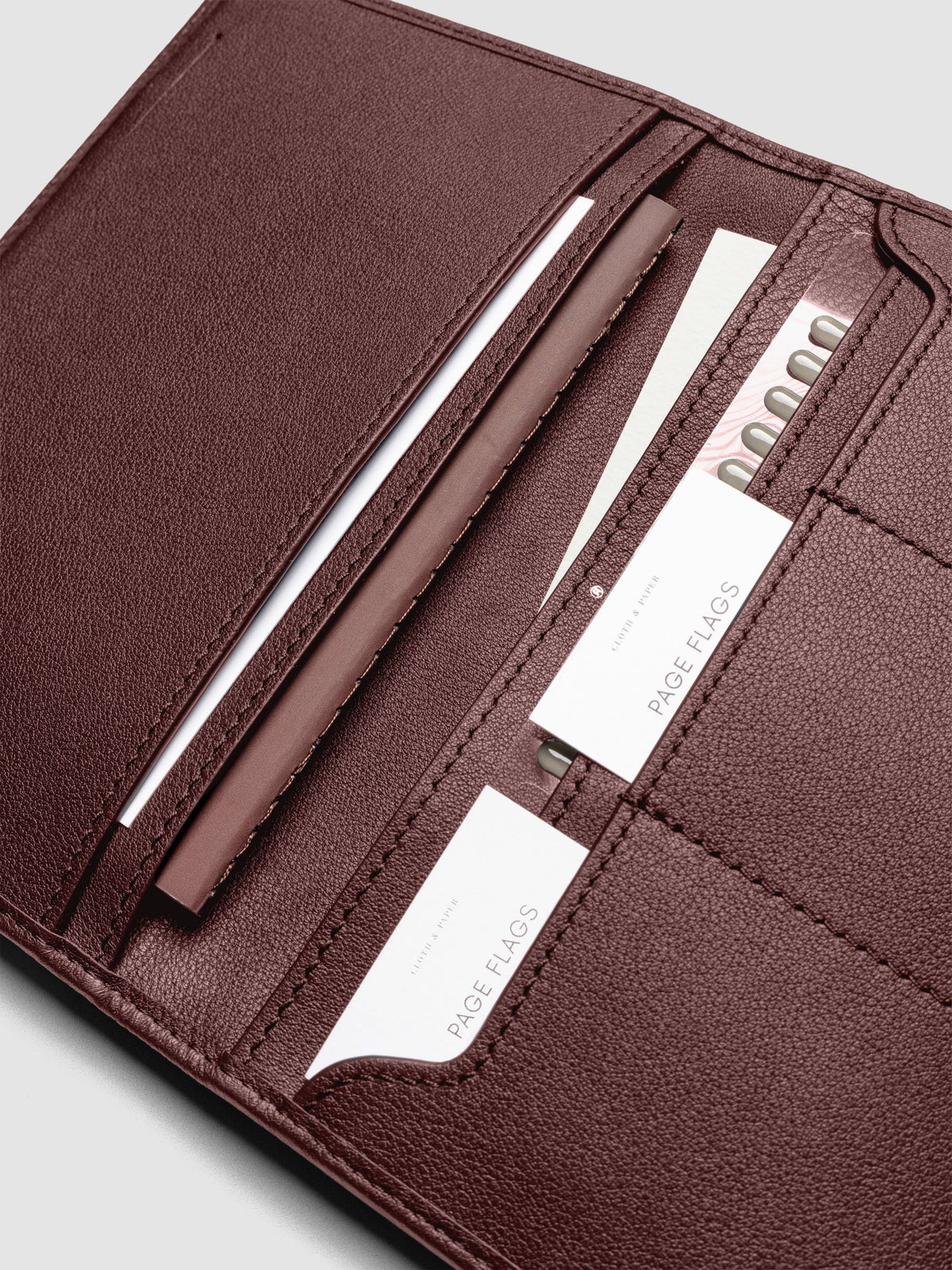 Close-up of Cloth & Paper products inside Nomada Wallet pockets in Madrid