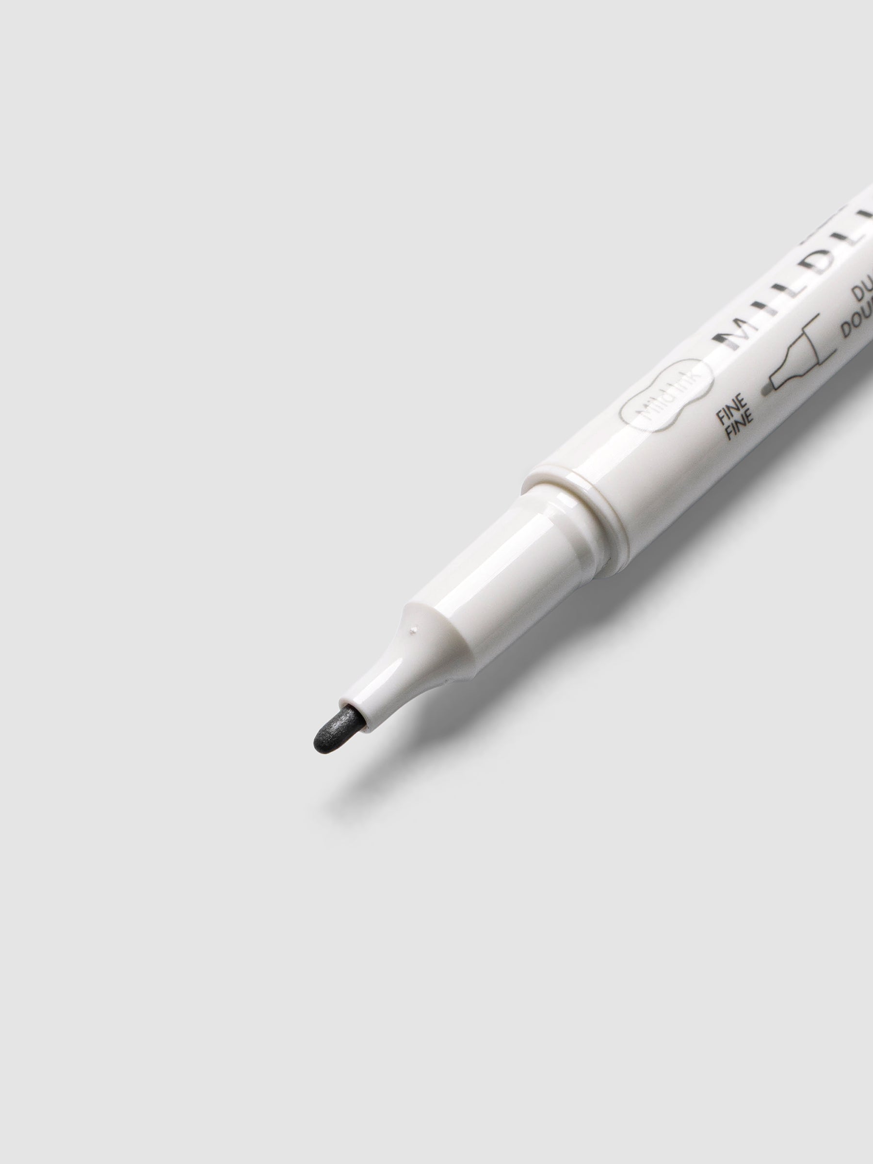 Close-up of Zebra Mildliner Dual-Tip Fineliner fine bullet tip in gray