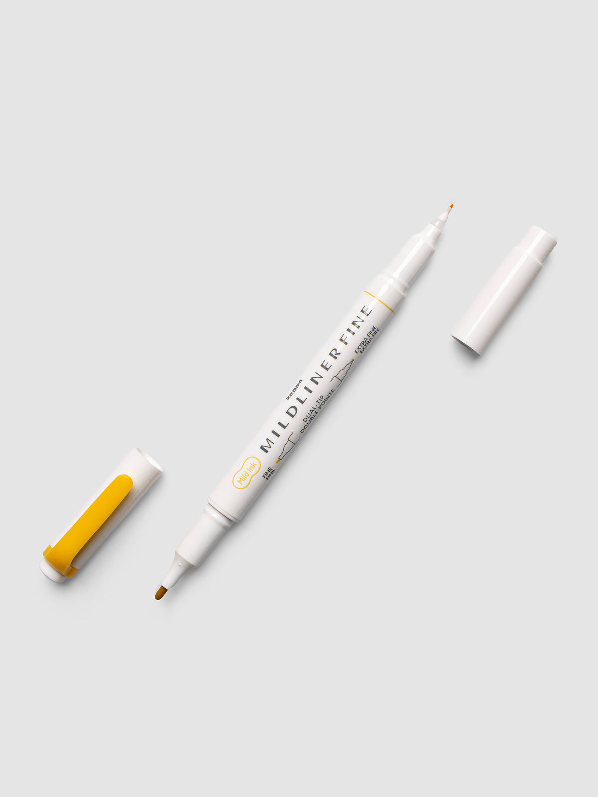 Zebra Mildliner Dual-Tip Fineliner in gold with both caps removed
