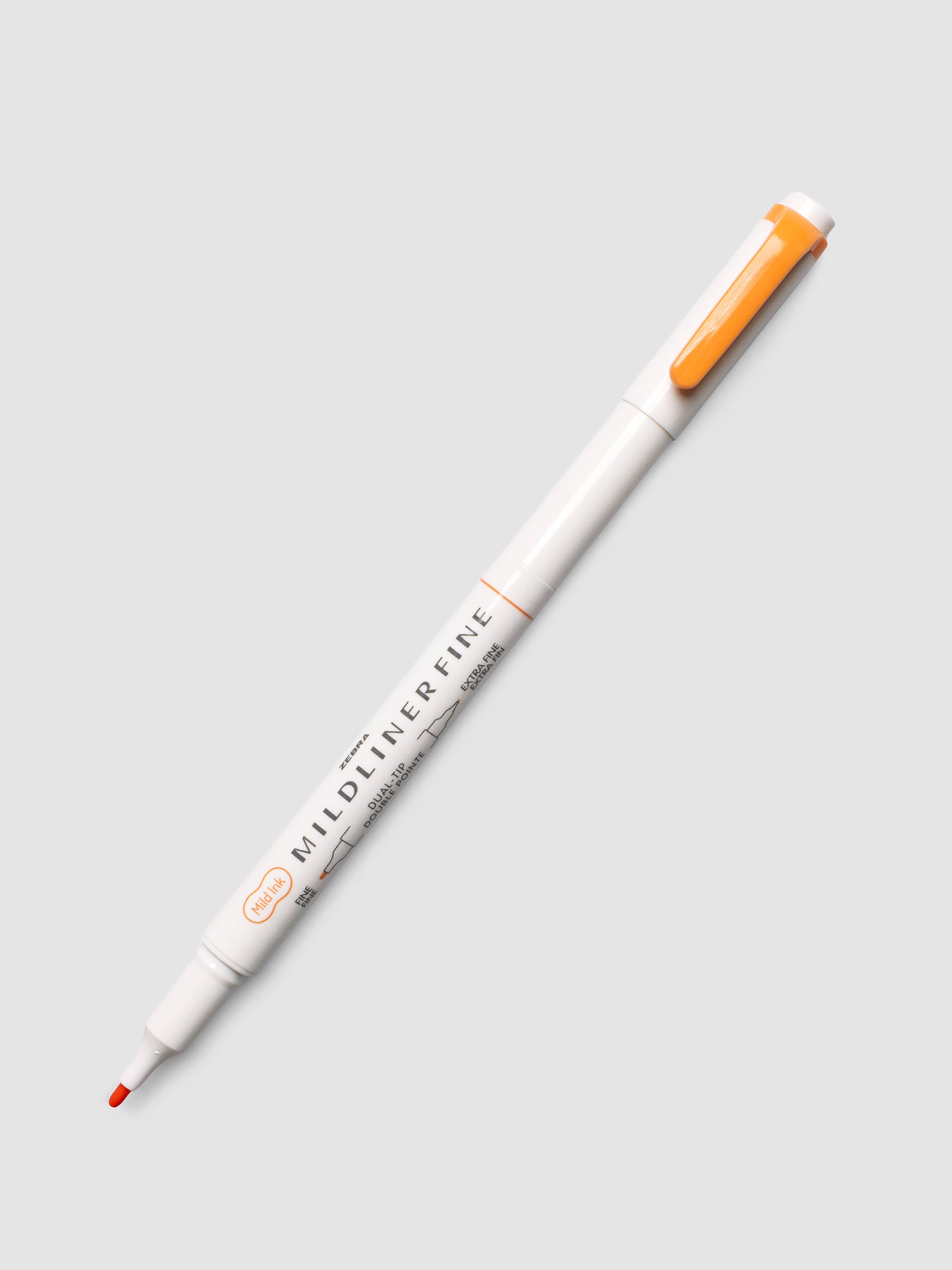 Zebra Mildliner Dual-Tip Fineliner in apricot with cap removed showing fine bullet tip