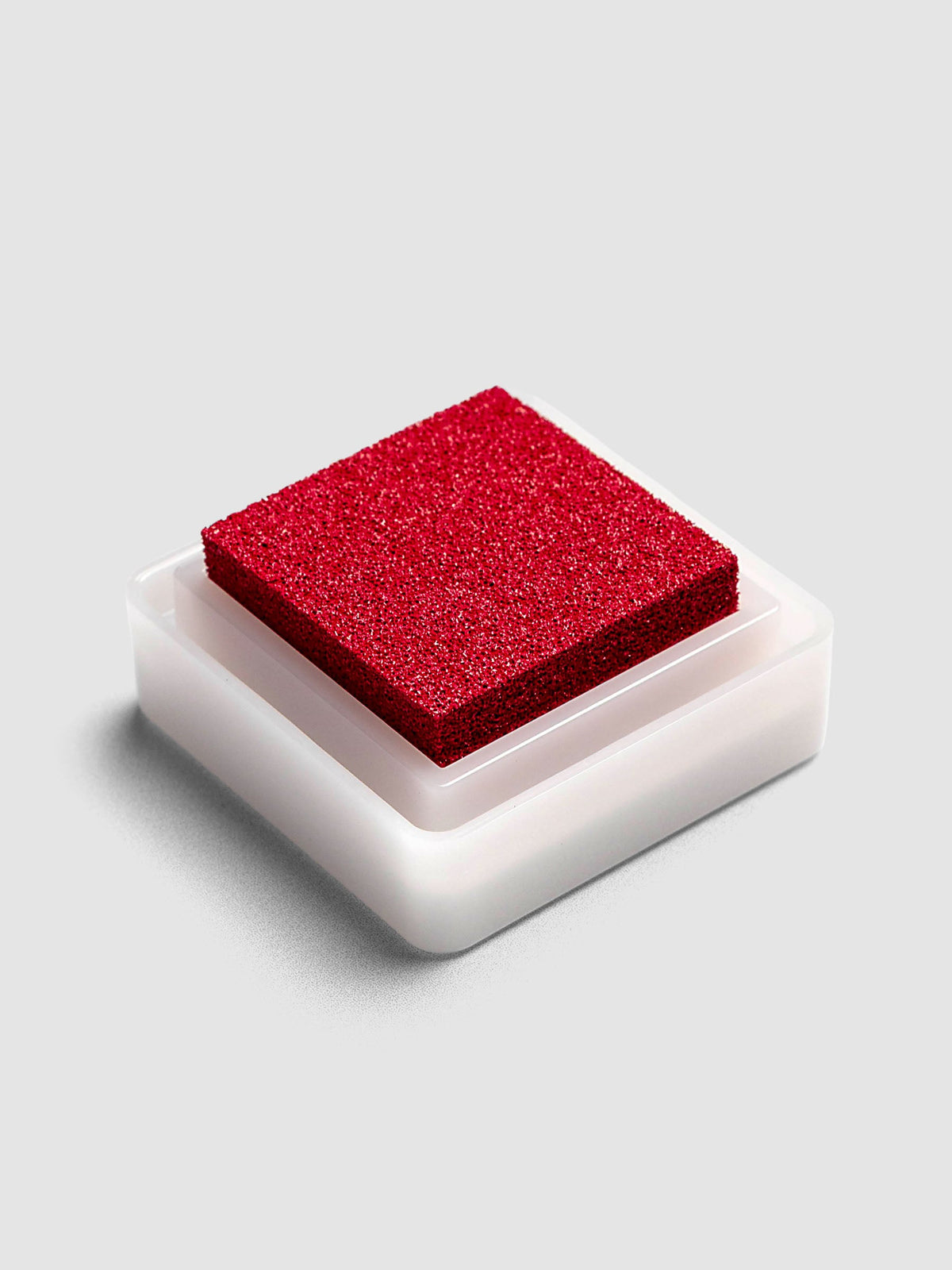 Artnic Stamp Ink Pad in magenta seen from the side with cover removed