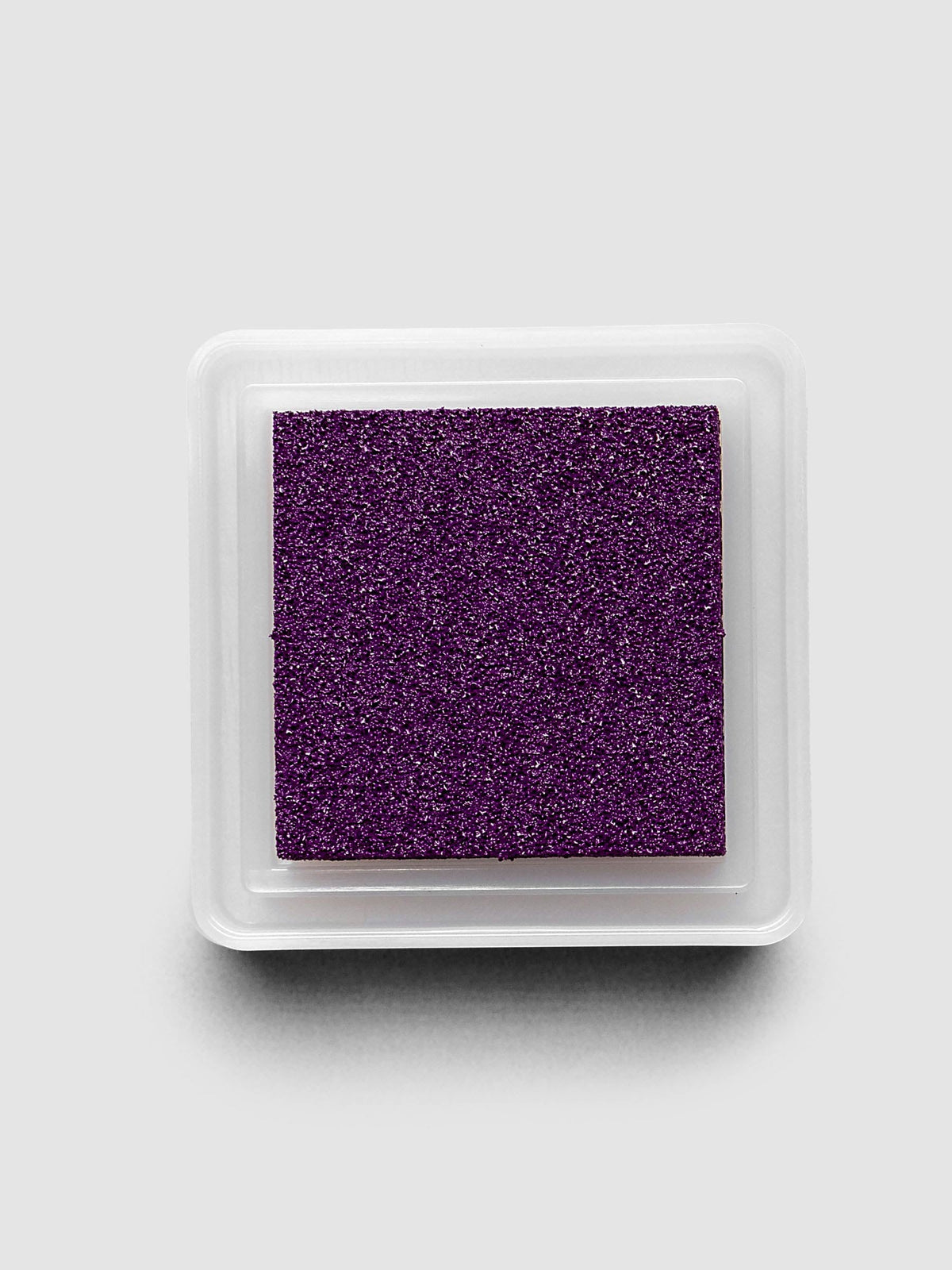 Artnic Stamp Ink Pad in boysenberry seen from the side with cover removed