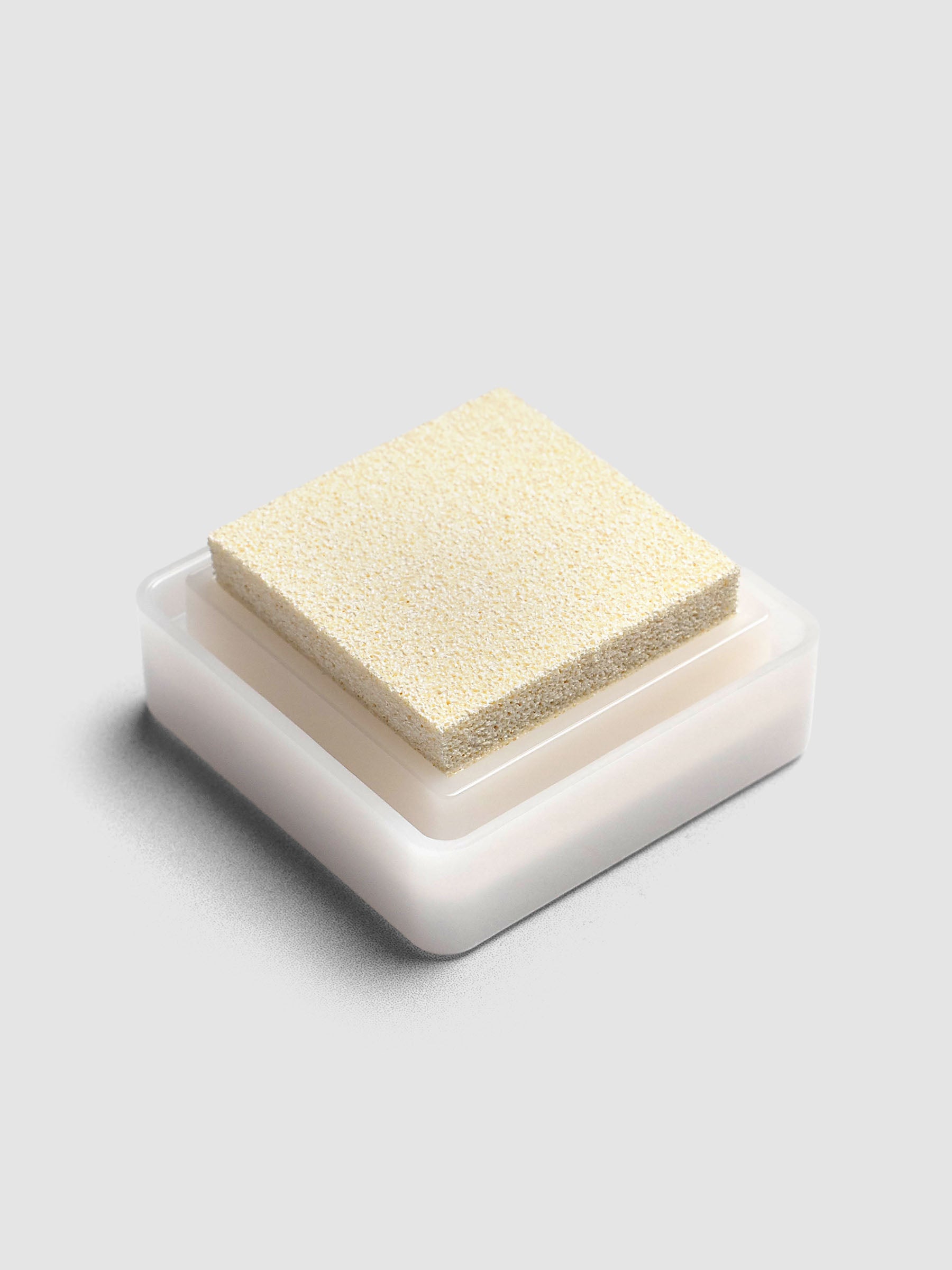 Artnic Stamp Ink Pad in white seen from the side with cover on