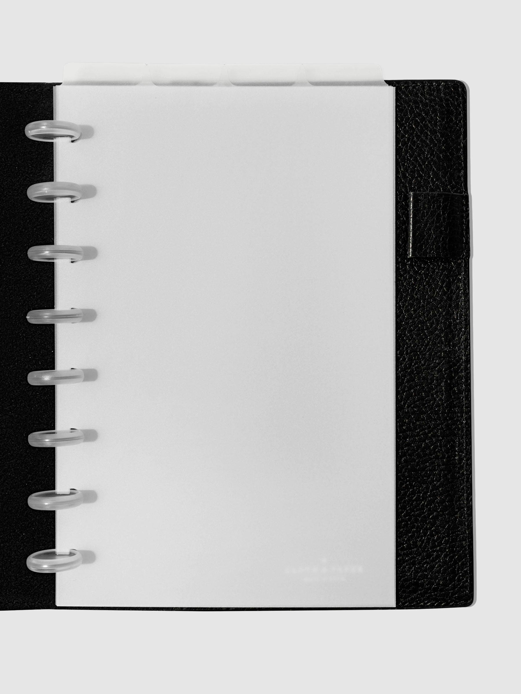 Half Letter Dividers in use inside a black leather planner.