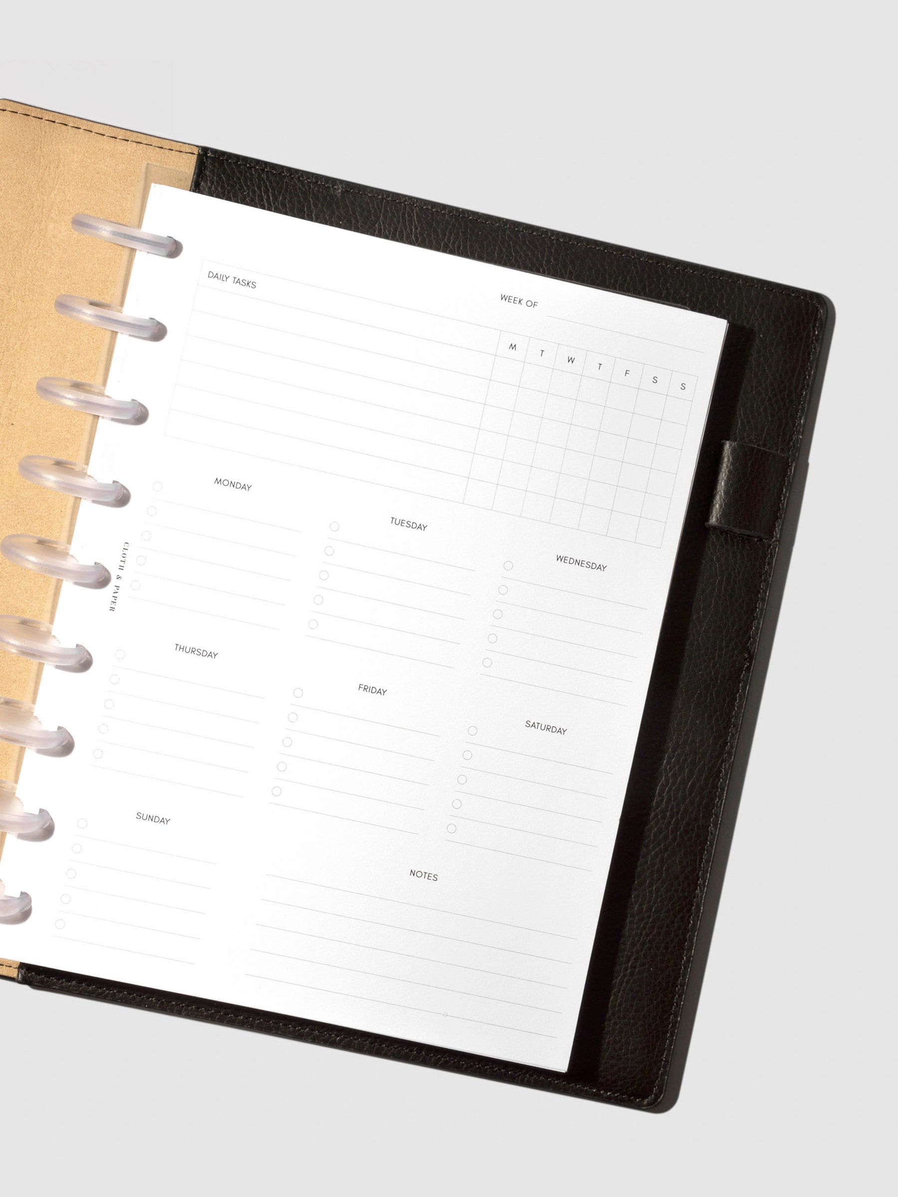 Insert in use inside a black leather planner.