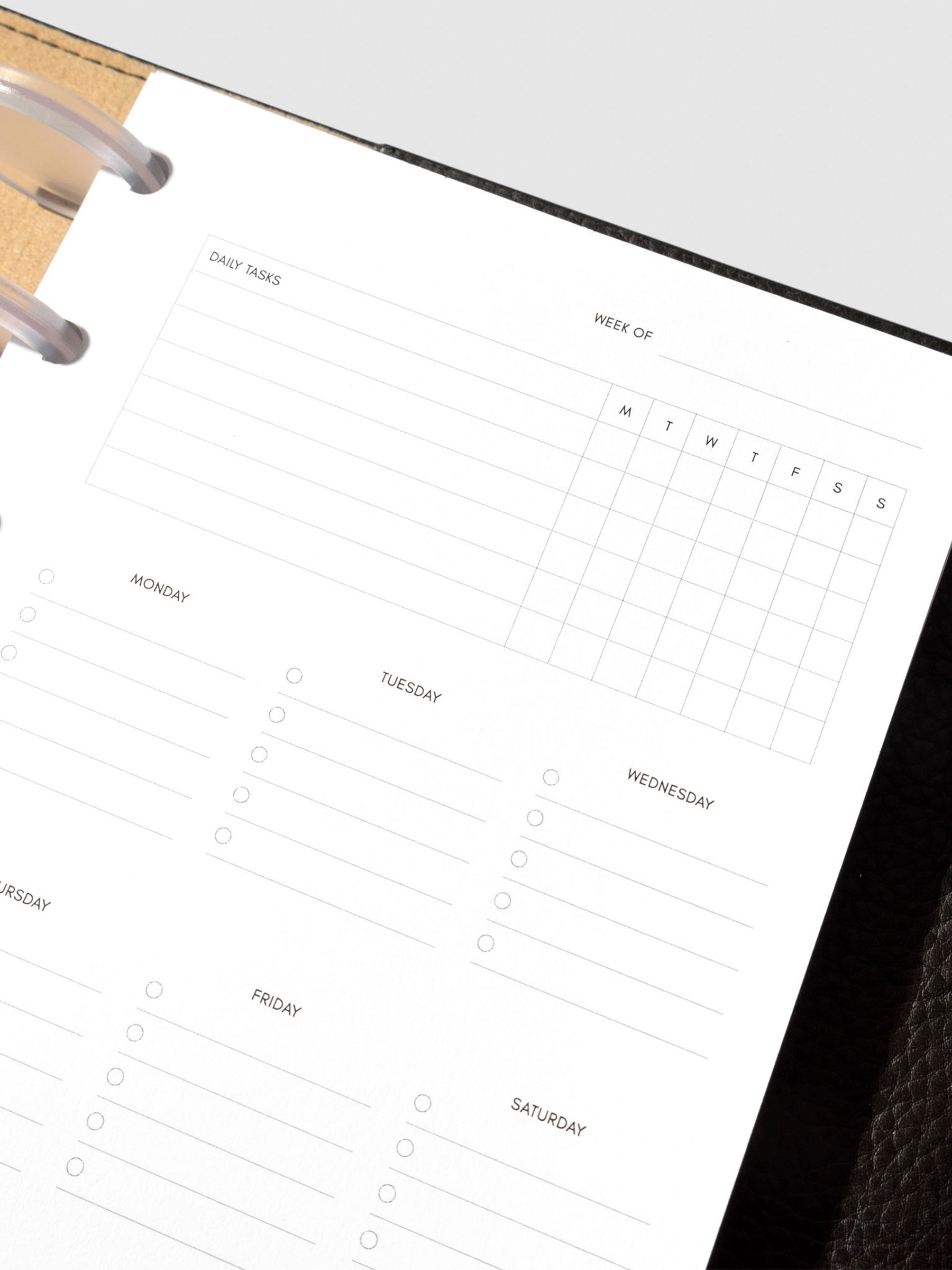 Insert in use inside a black leather planner.