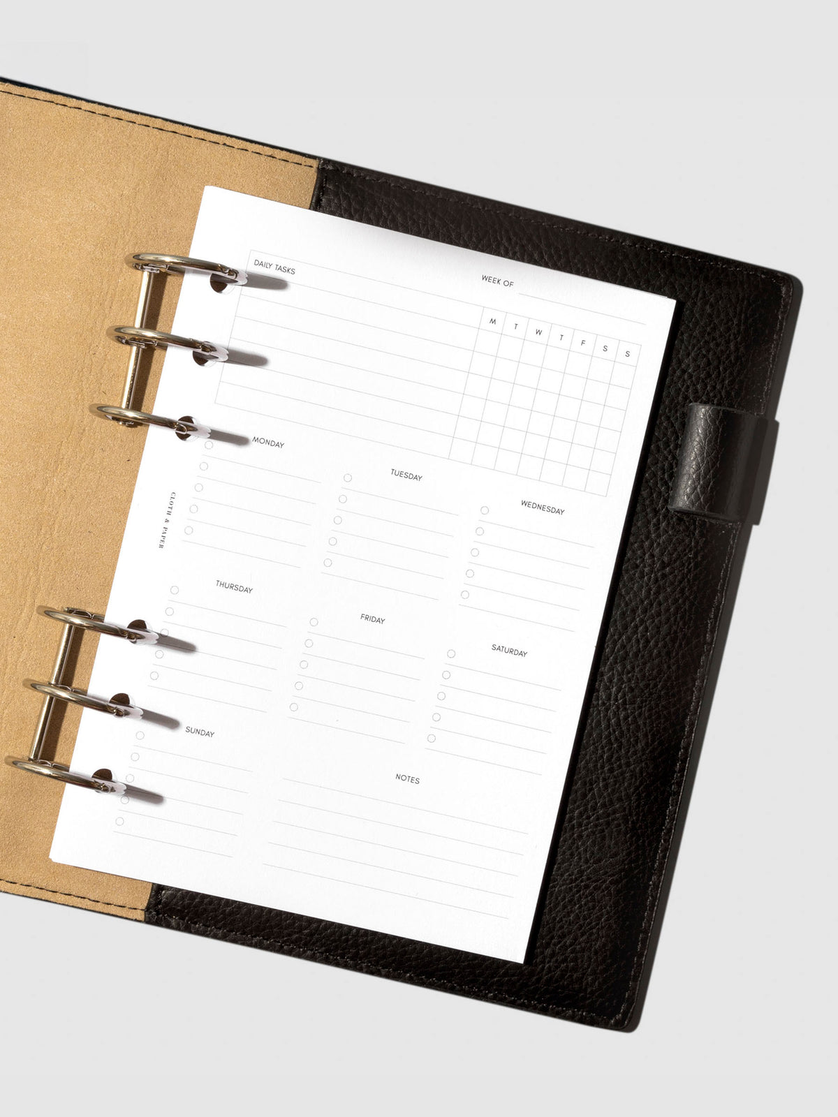 Insert in use inside a black leather planner.