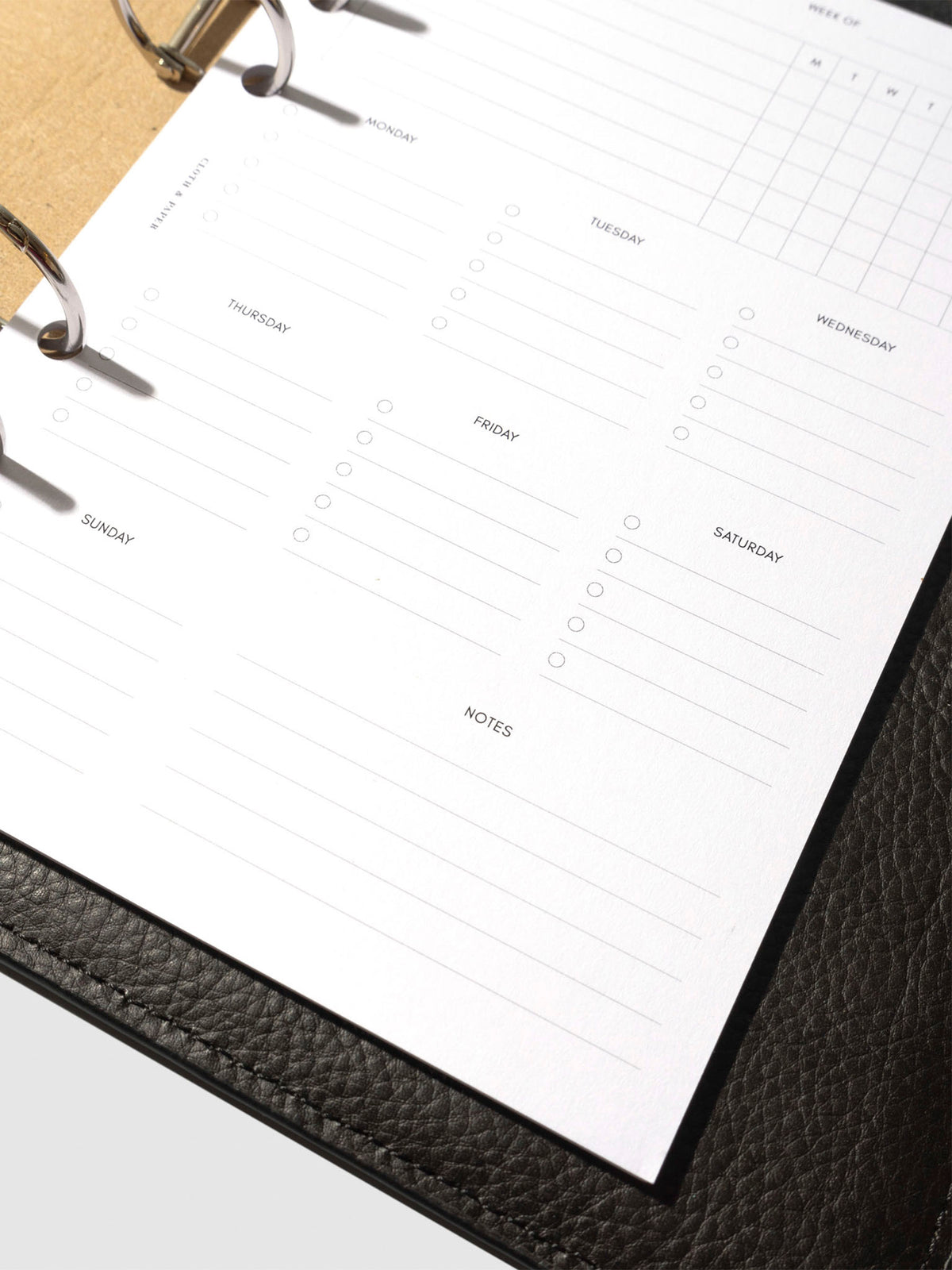 Insert in use inside a black leather planner.