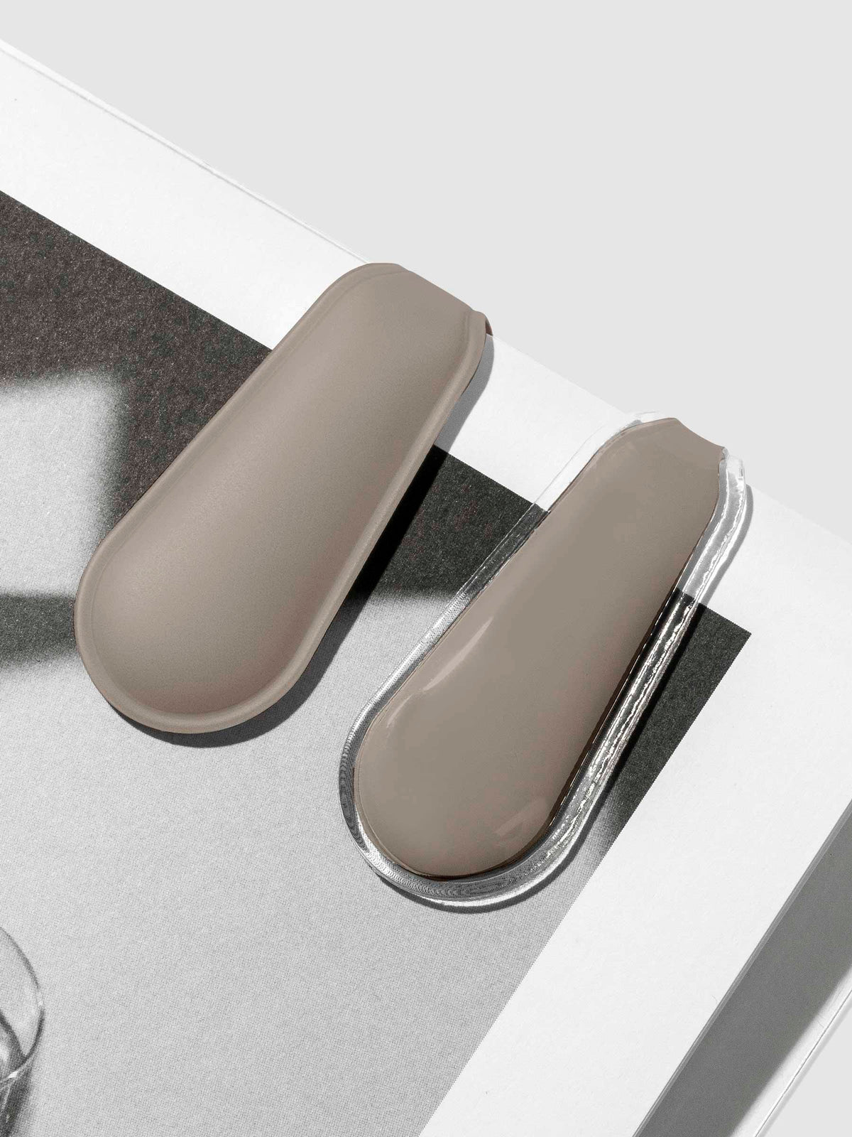 Clips in use inside a leather folio.