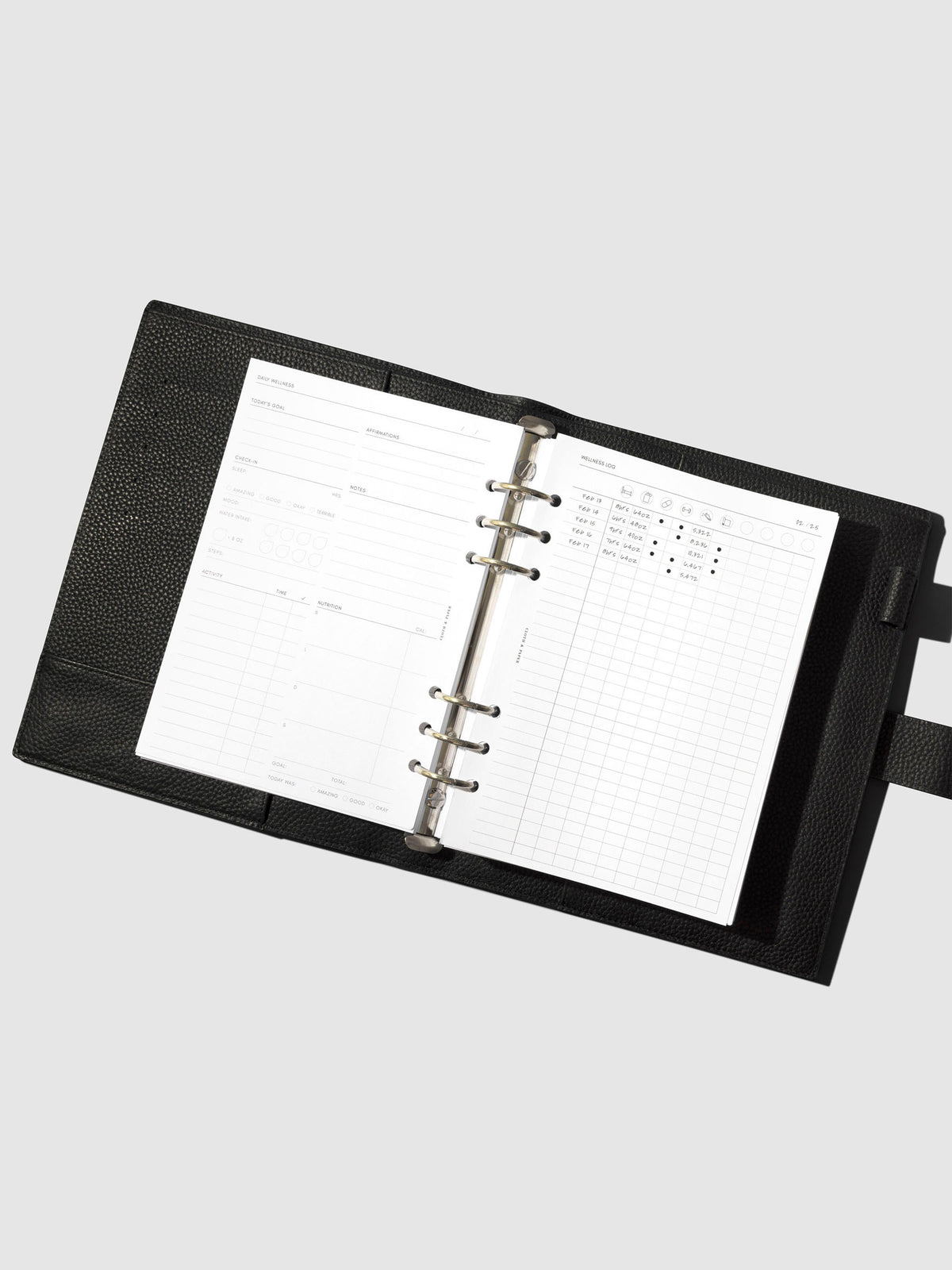 Inserts shown in use inside a leather planner. Size shown is A5.