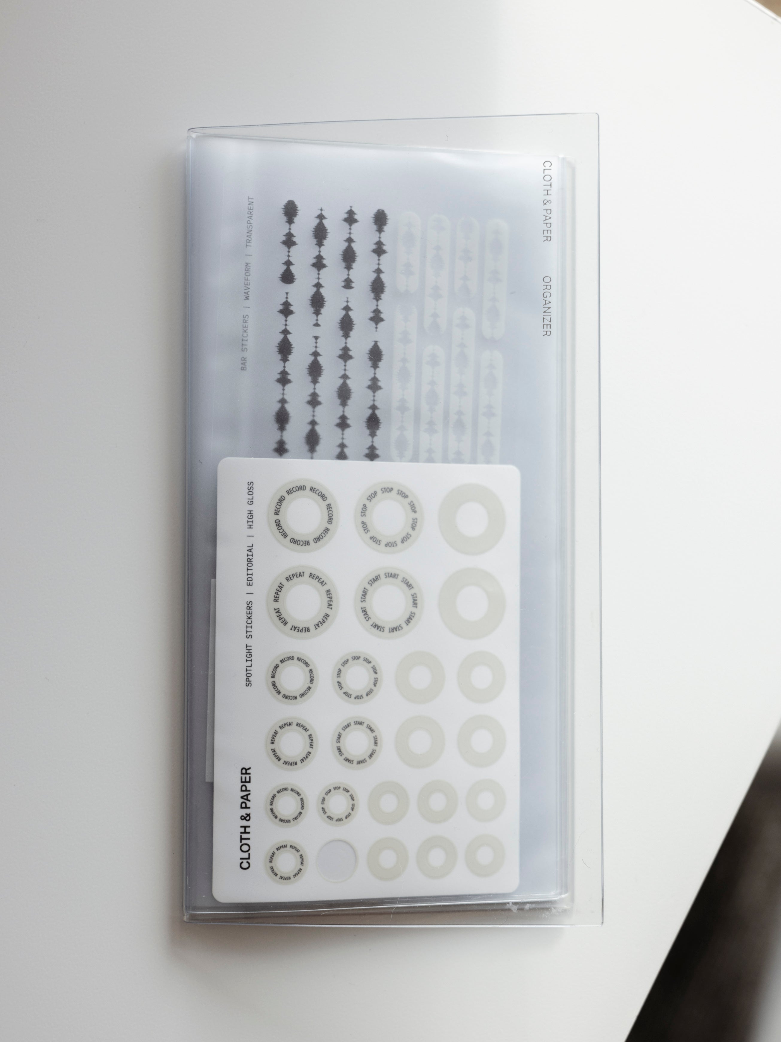 A5 Slim sized clear organizer with sticker sheets in the inner pockets.