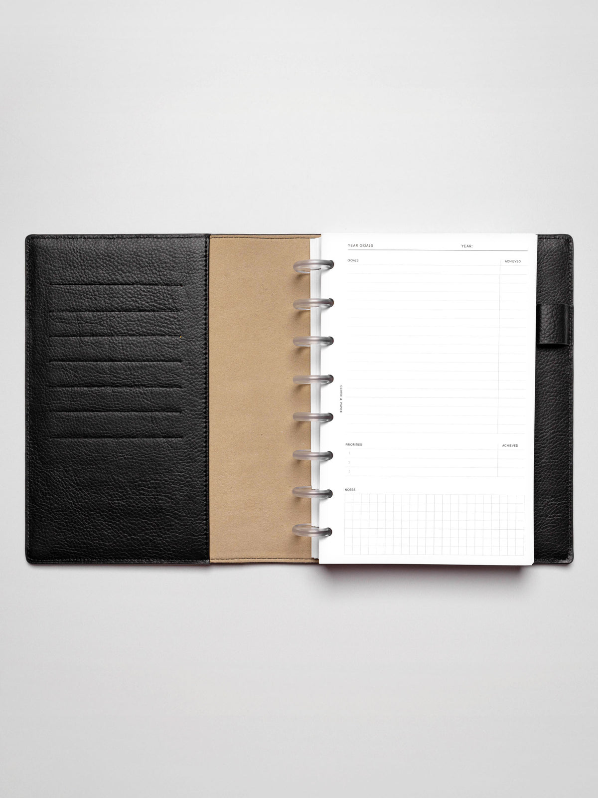 Insert in use inside a discbound planner system. Size shown is HalfLetter.