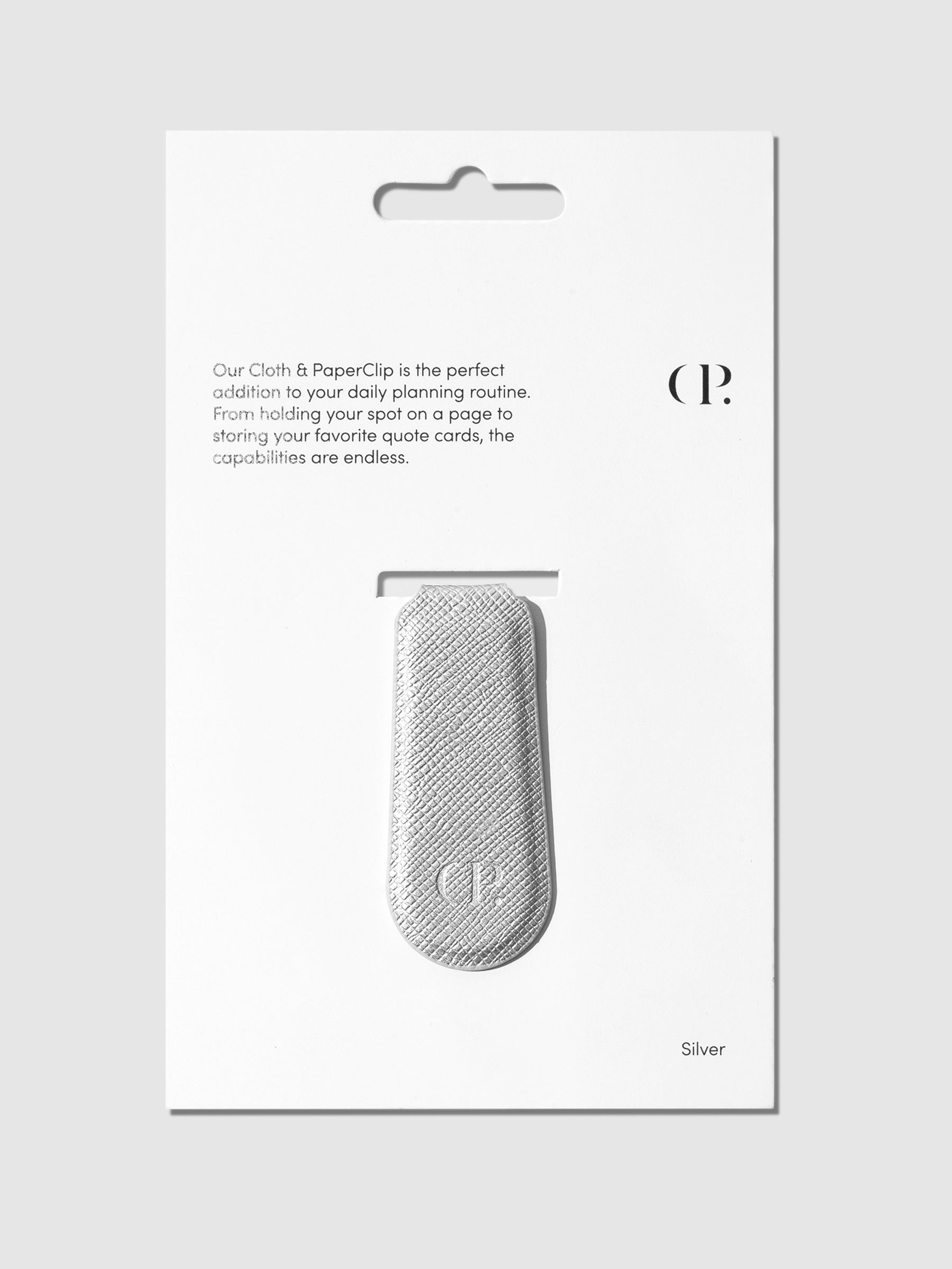 Silver Cloth & Paperclip displayed on a gray background.