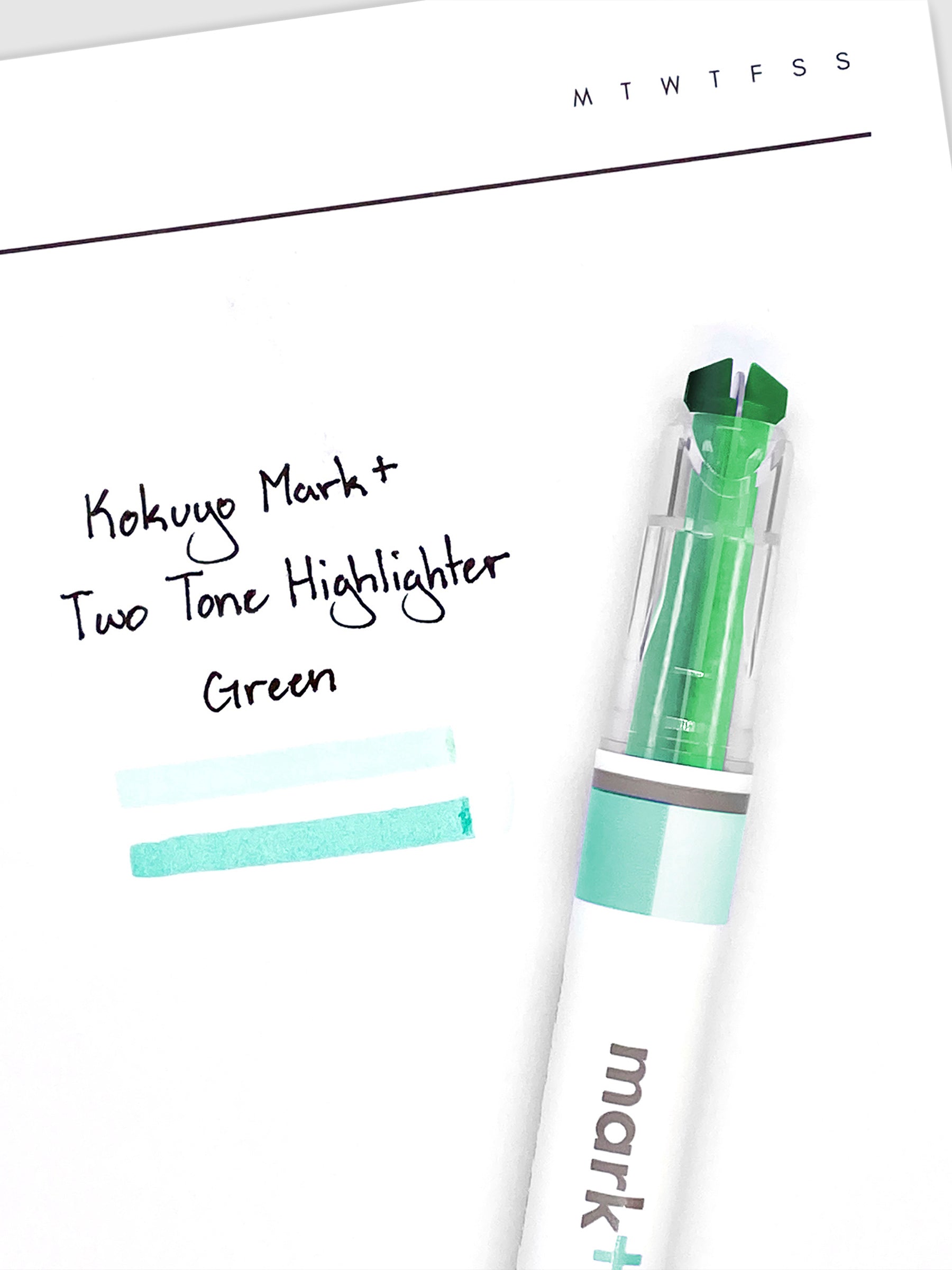 Highlighter resting on a sheet of paper displaying highlight samples from both nibs and ink colors.