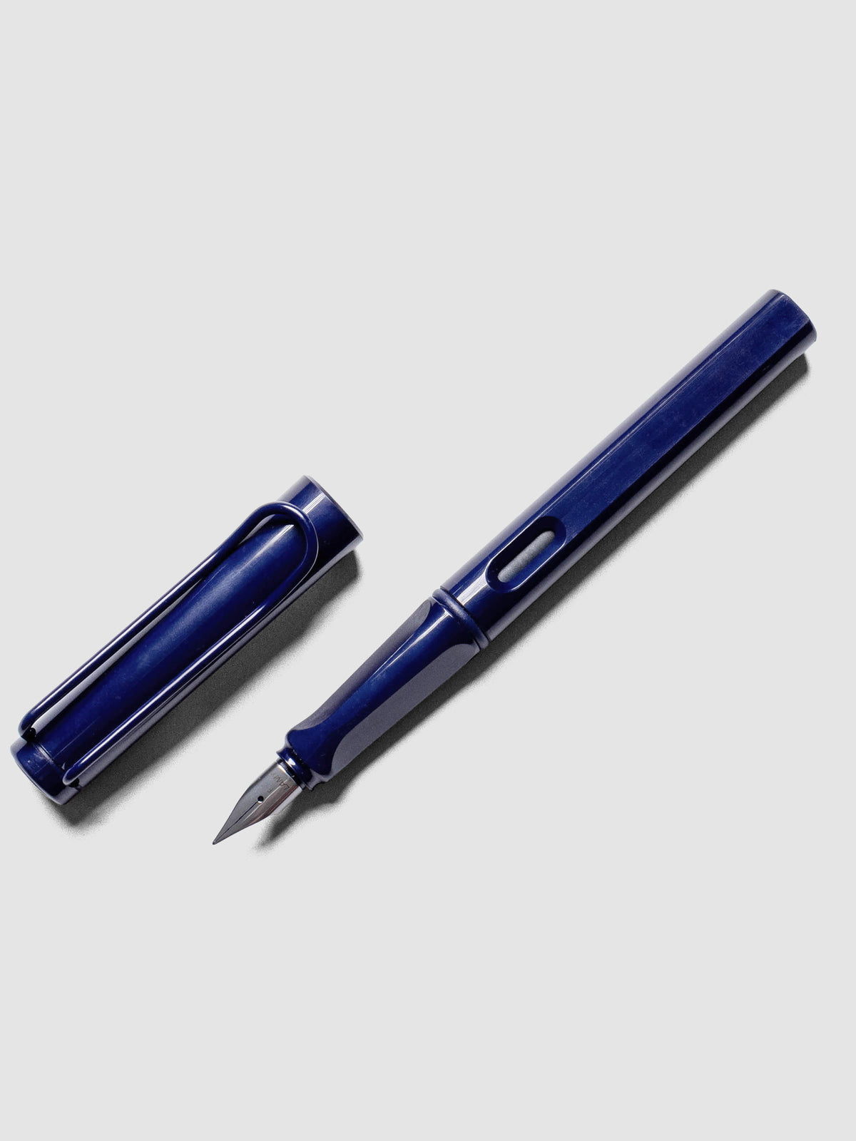 LAMY Safari Fountain Pen in the color Dark Dusk with Fine nib shown diagonally with the cap off.