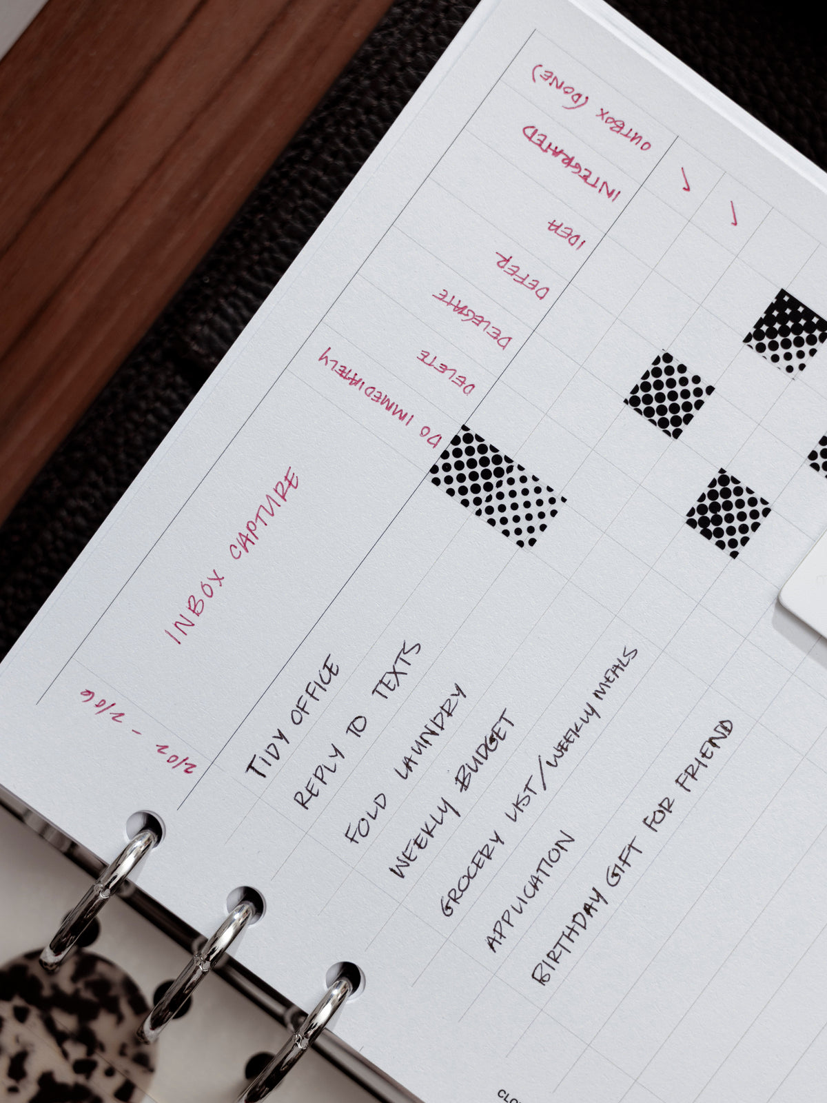 Close up image of the Inbox Sorting Planner Inserts in use with stickers as a habit tracker.